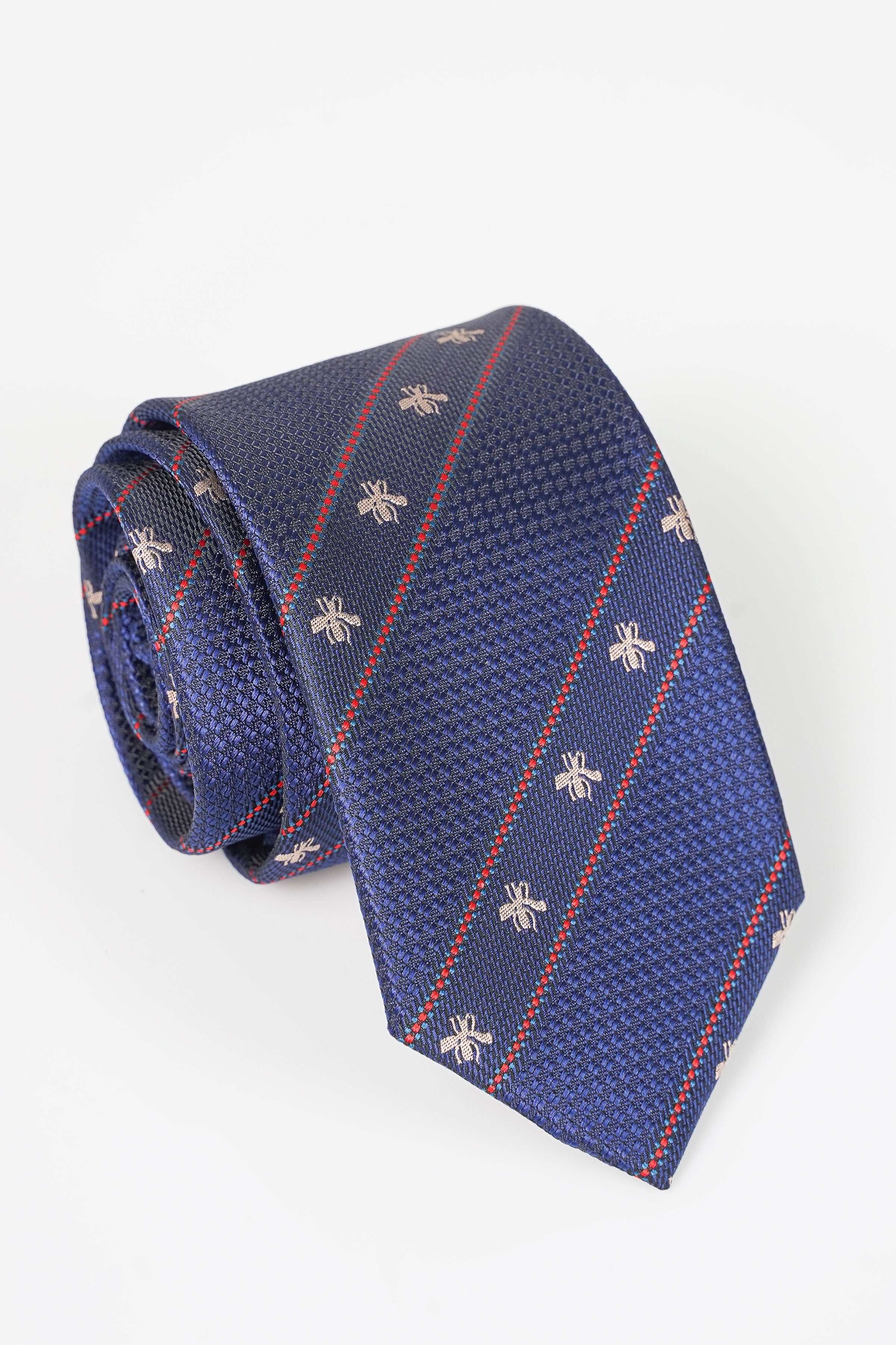 Blue poly silk tie with red plaid stripes and small fleur-de-lis motifs