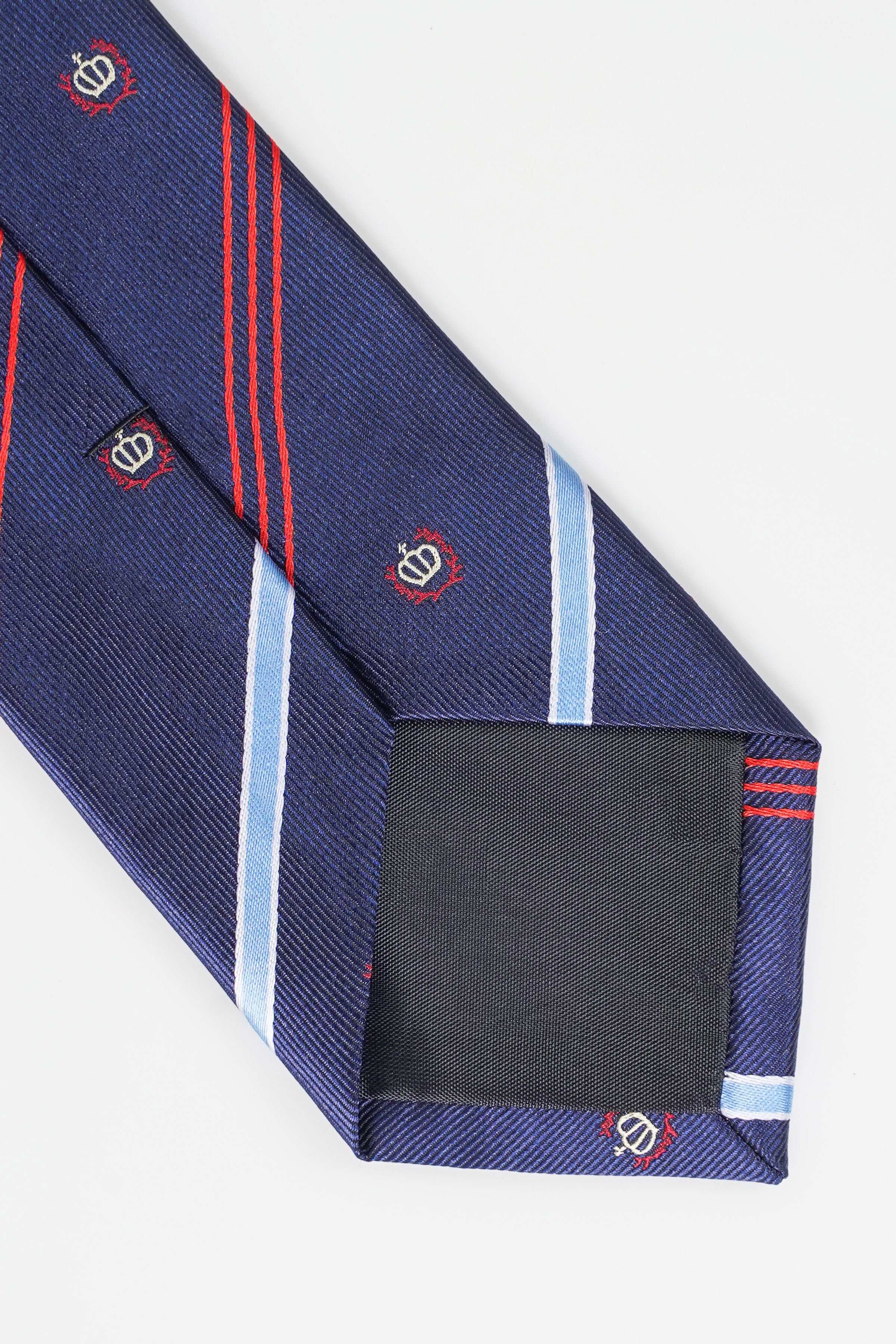Navy poly silk tie with diagonal light-blue and red lines, pointed end with black tag