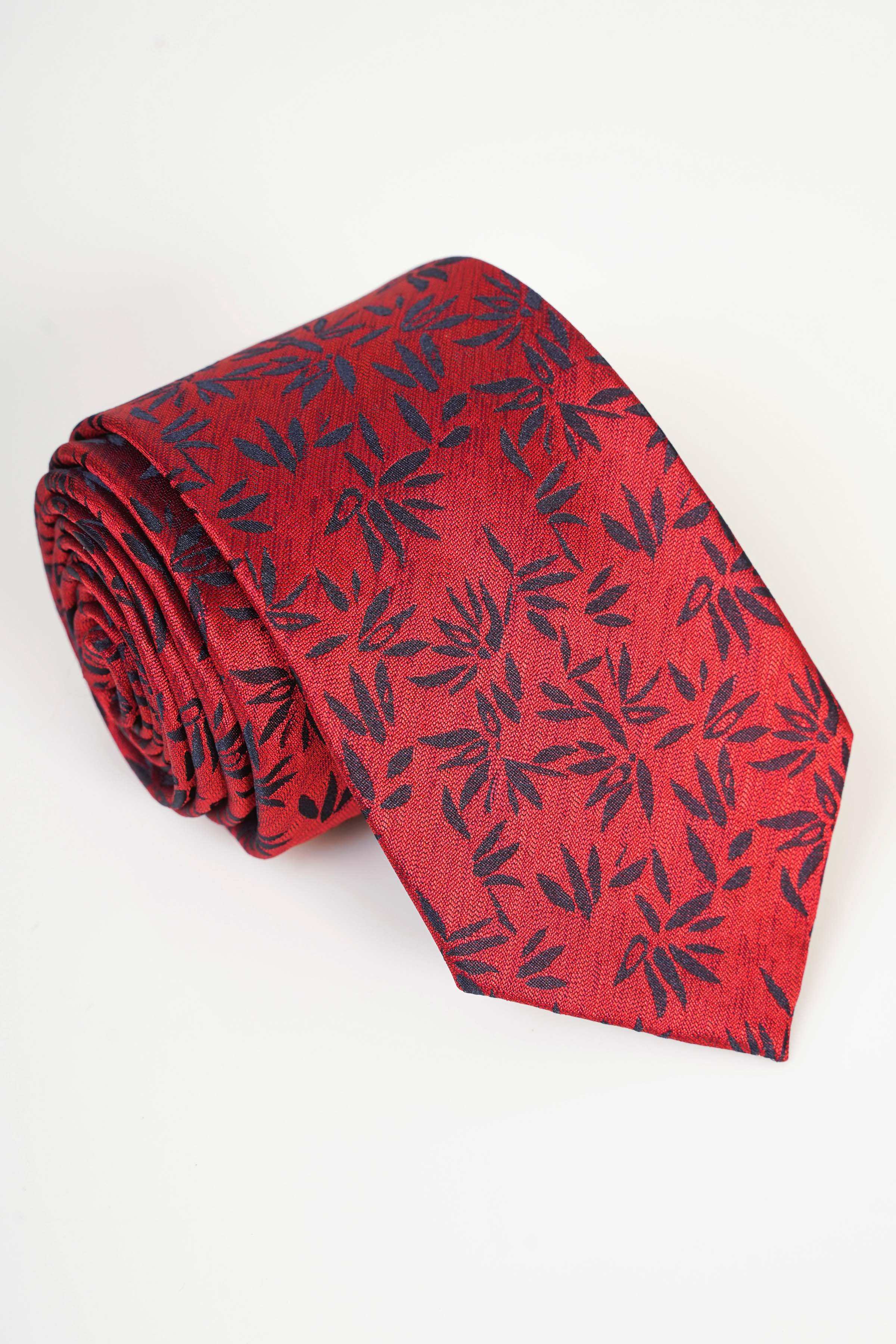 Red polyester silk tie with dark leaf pattern and slim pointed end