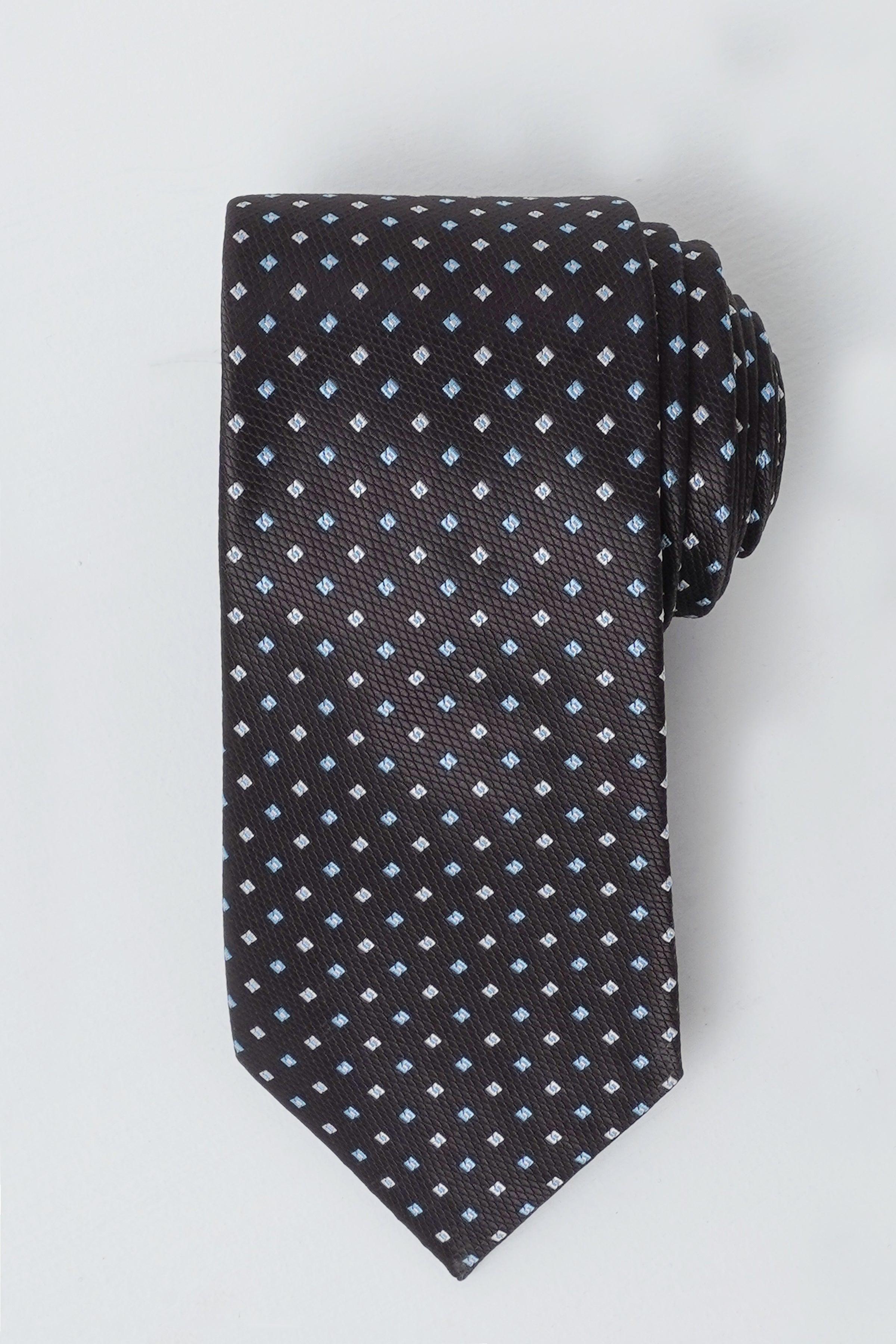 Dark navy tie with small geometric dots pattern, slim width