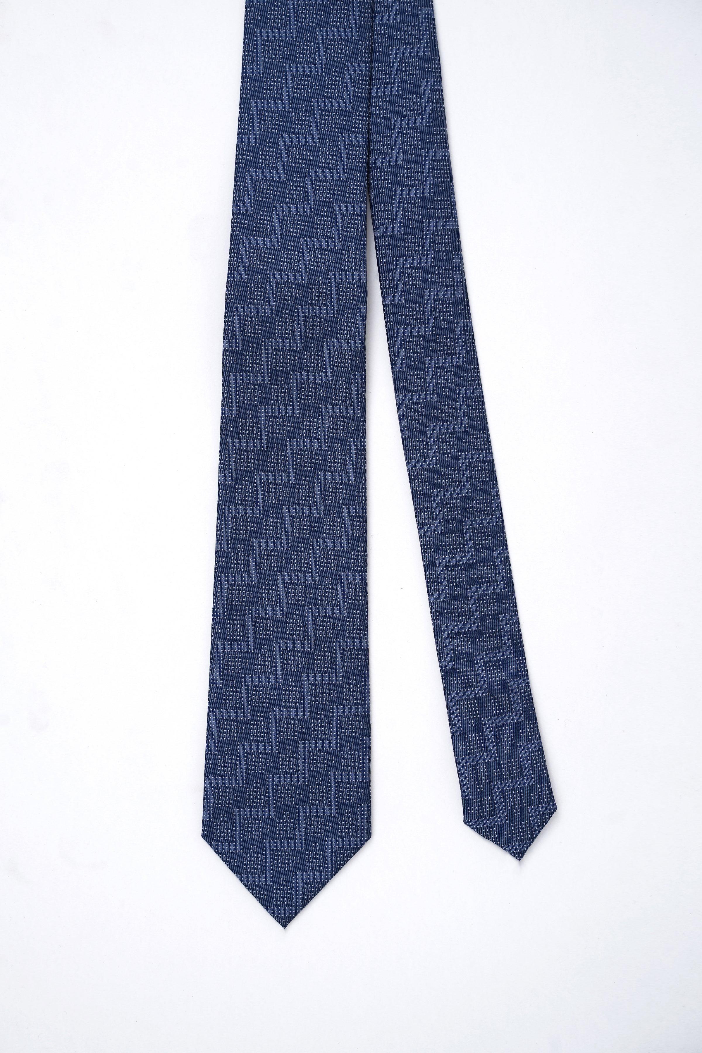 Navy blue patterned poly silk tie, two ends with pointed tips