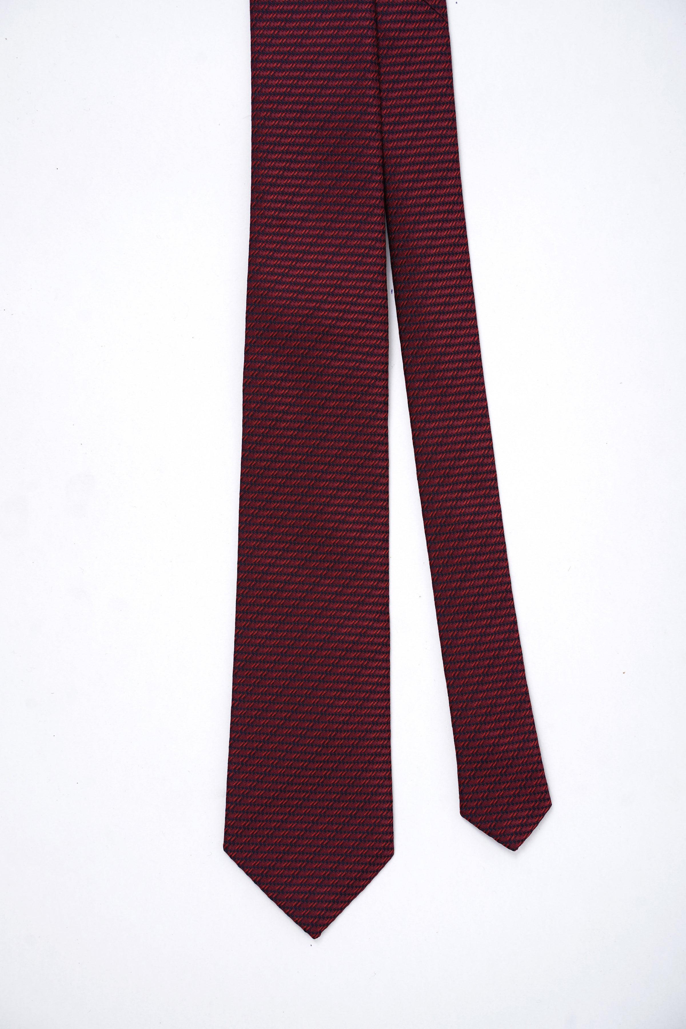 Burgundy textured necktie shown front view, two overlapping tips