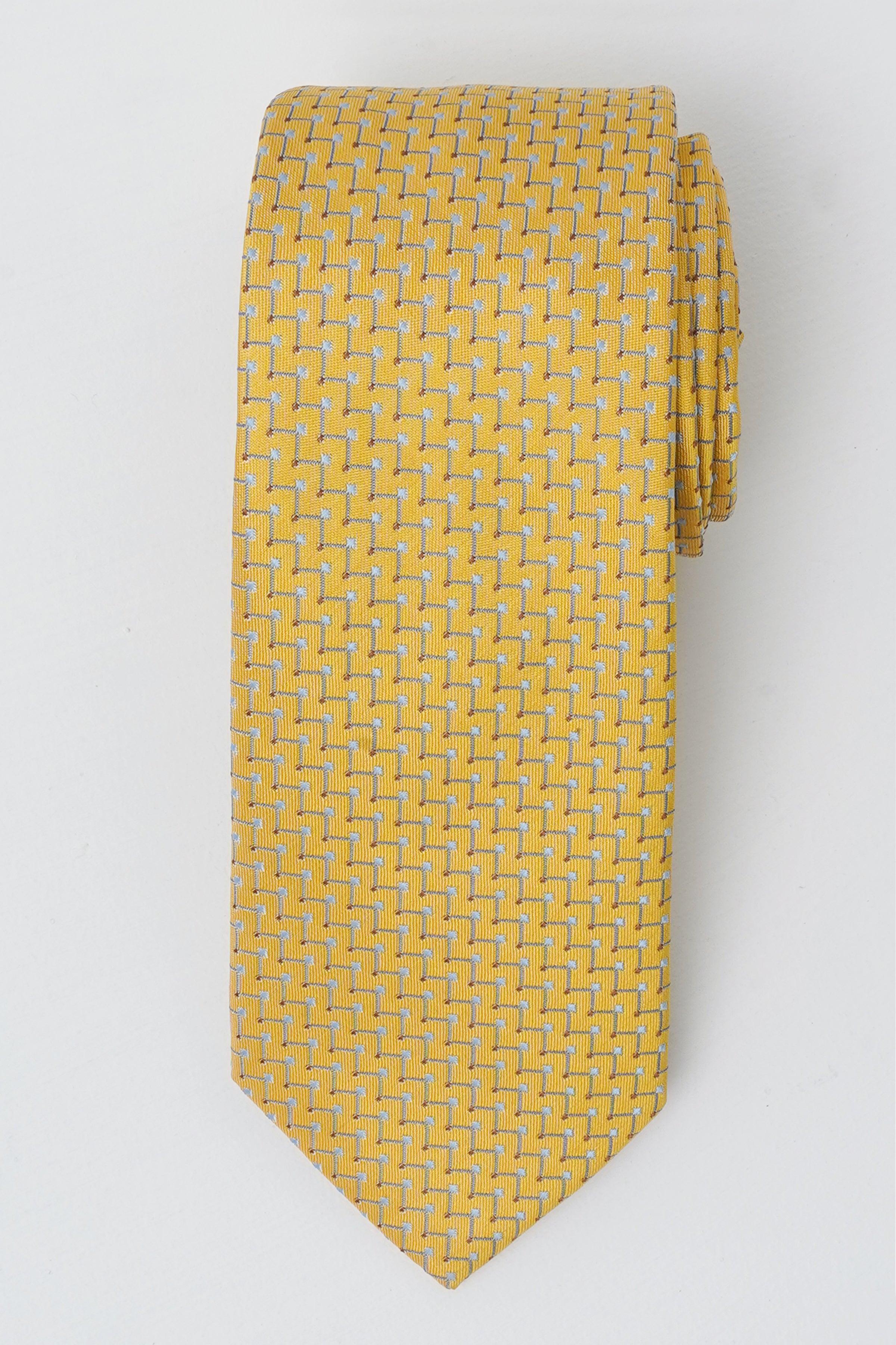 Poly silk tie in yellow with repeating geometric pattern