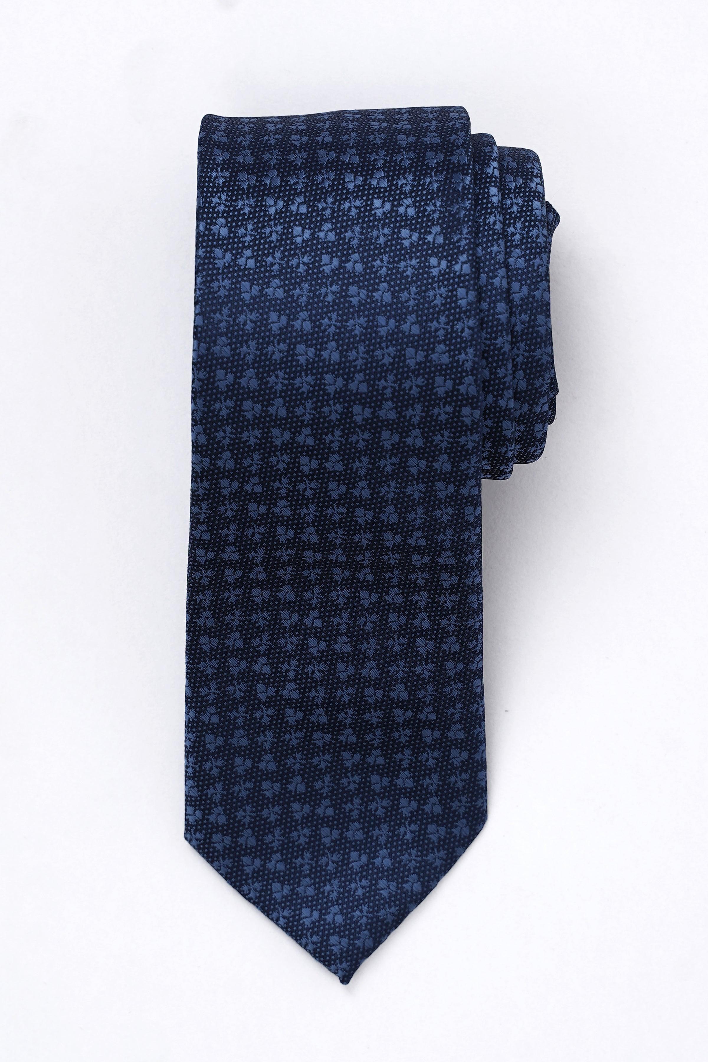 Poly silk tie in dark navy with small repeating micro-pattern, pointed tip