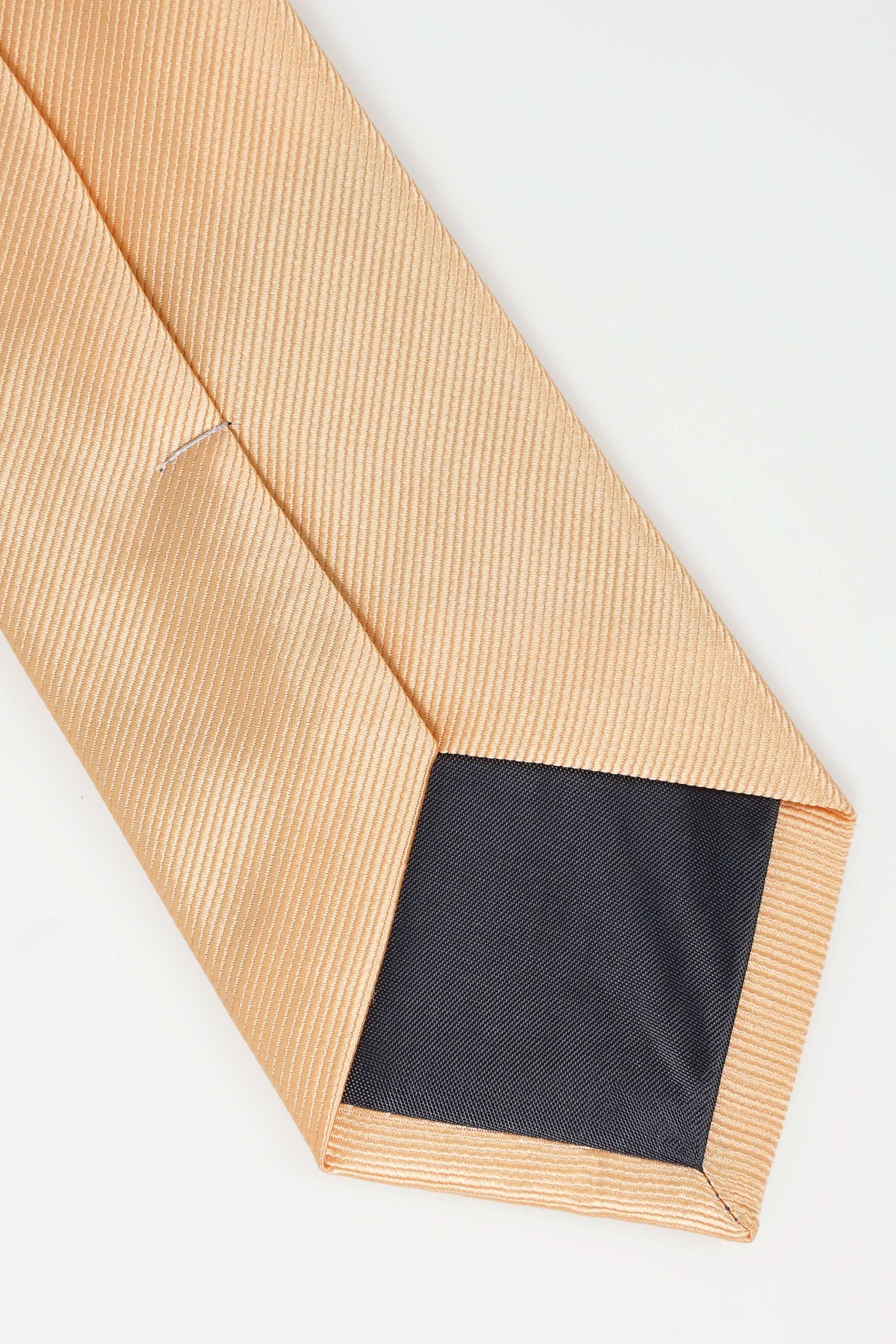 Beige textured necktie with seam detail and folded tip