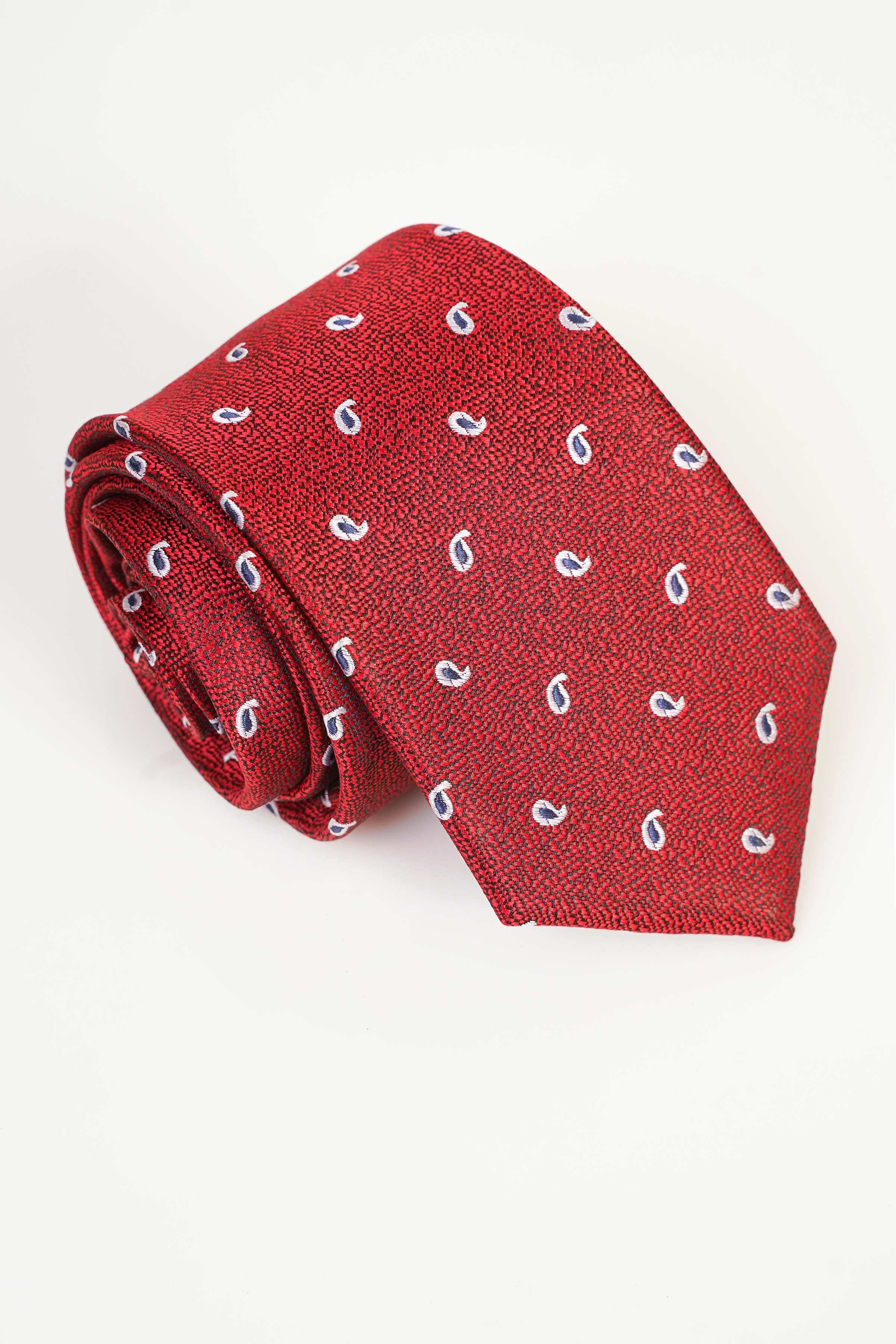 Red polyester silk tie with repeating paisley-like motifs in blue