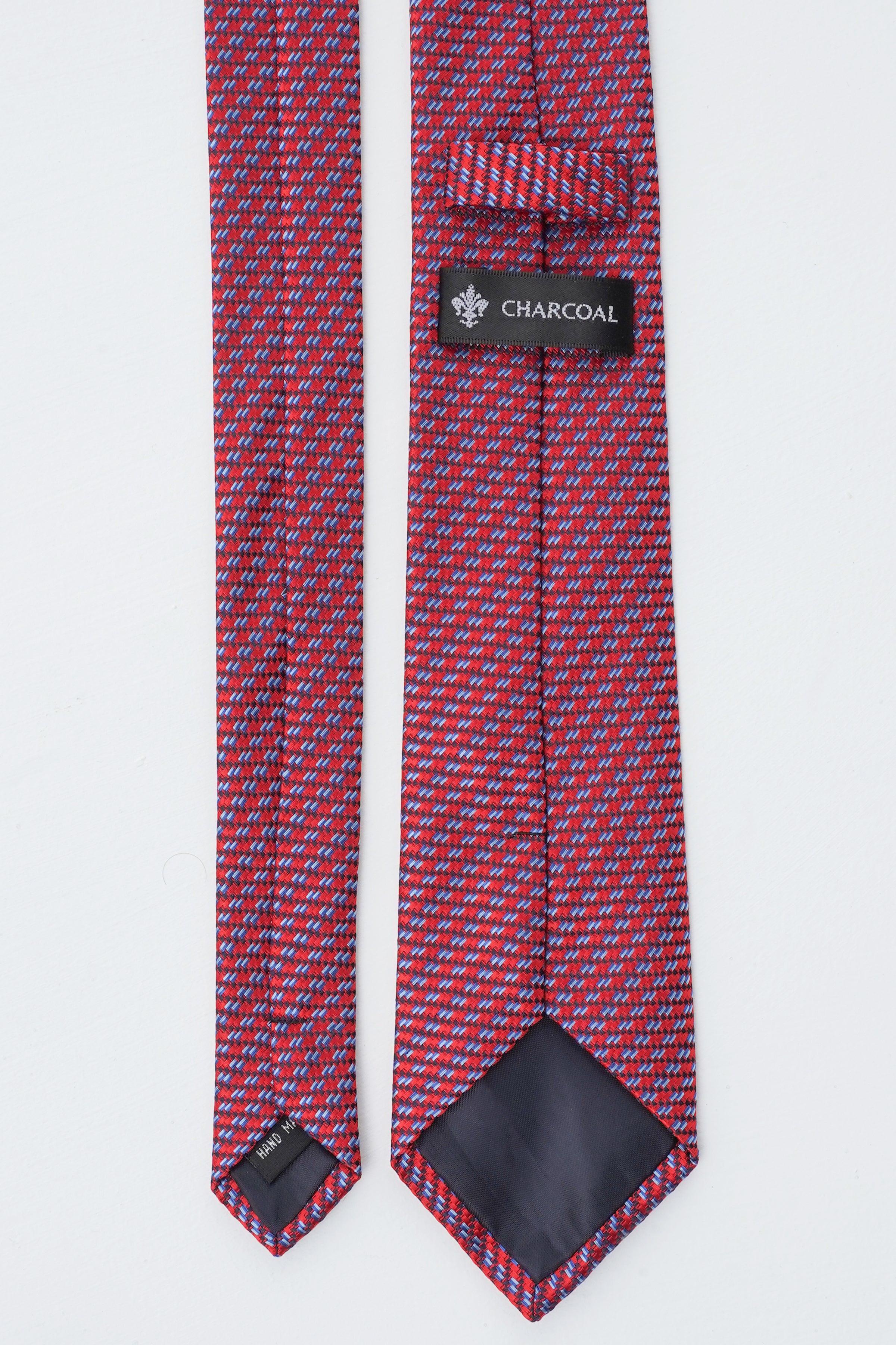 Poly silk tie, dark red and blue micro-pattern; CHARCOAL keeper label and pointed tip