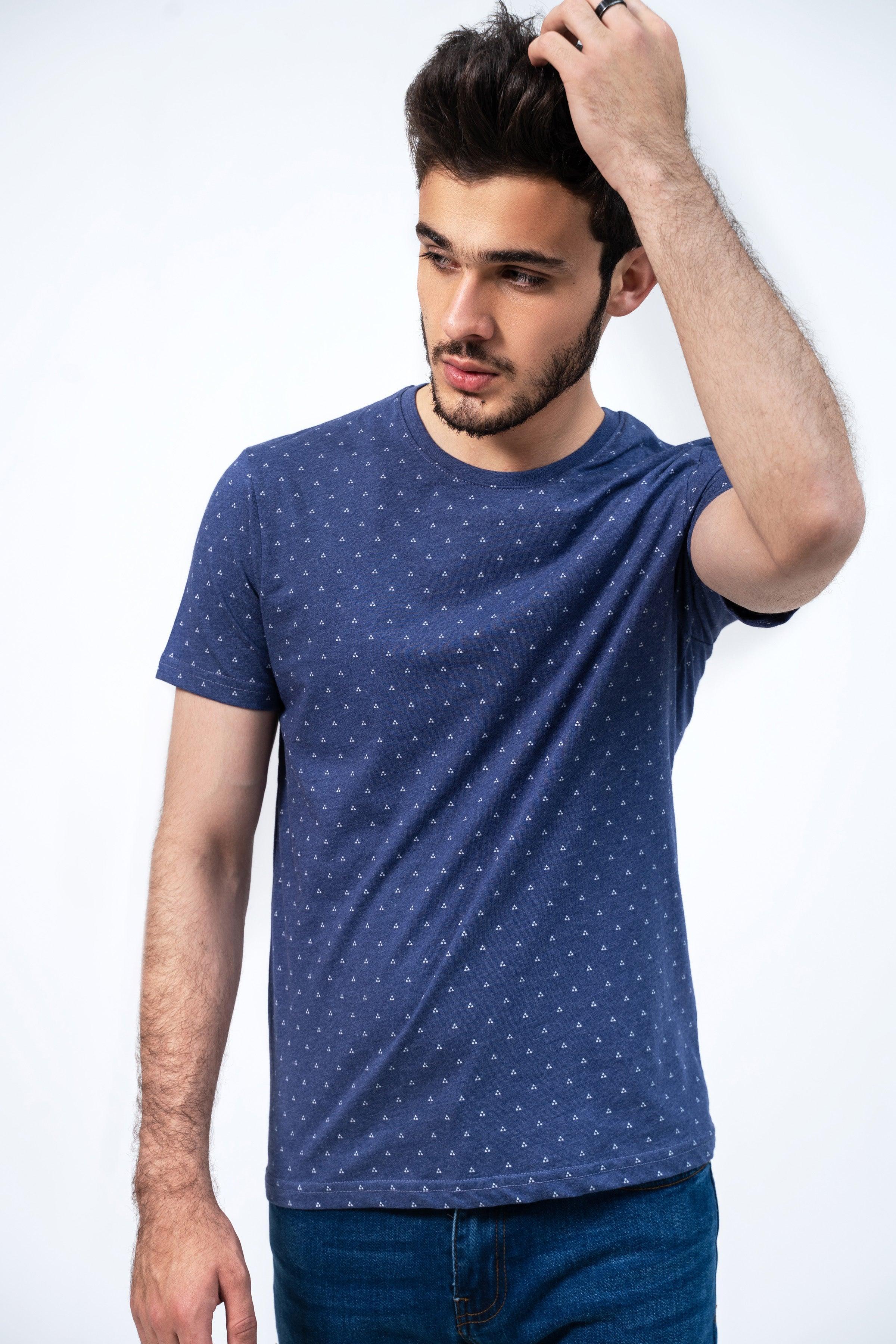 Navy printed crew-neck T-shirt with allover dots, model arm raised