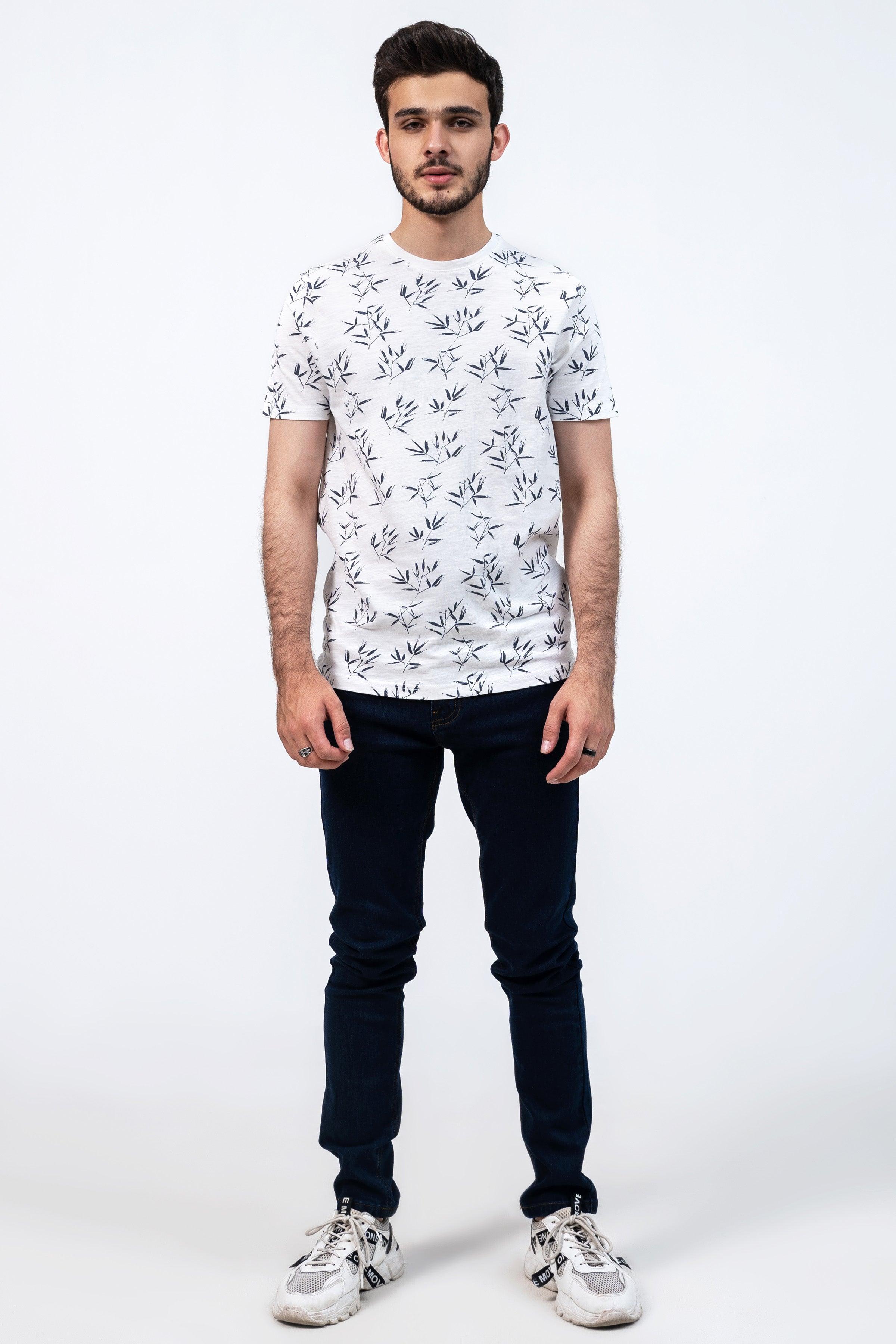 Off-white printed T-shirt with dark leaf pattern, crew neck and short sleeves