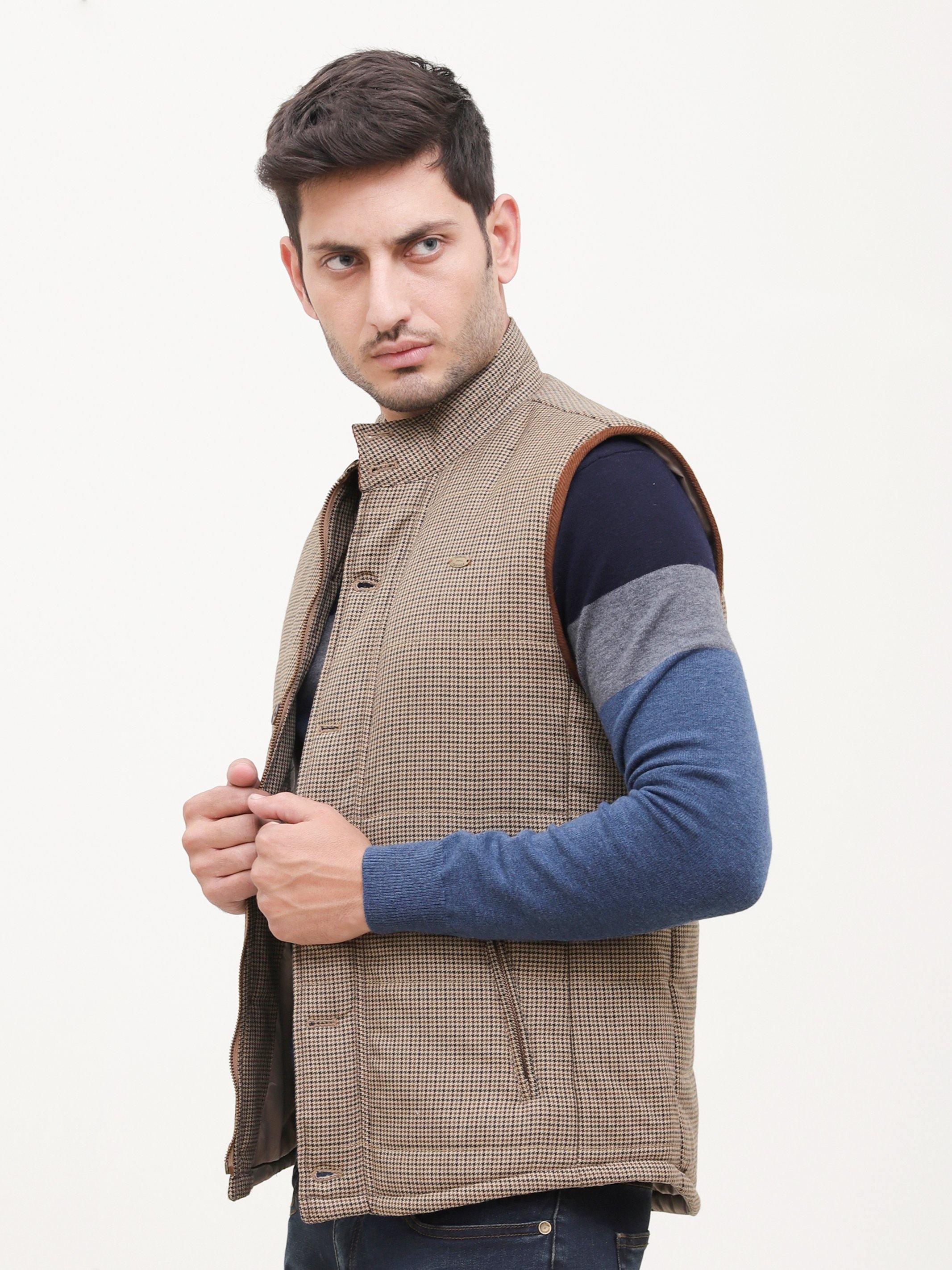 Tan quilted check sleeveless vest with button-front and stand collar, side view