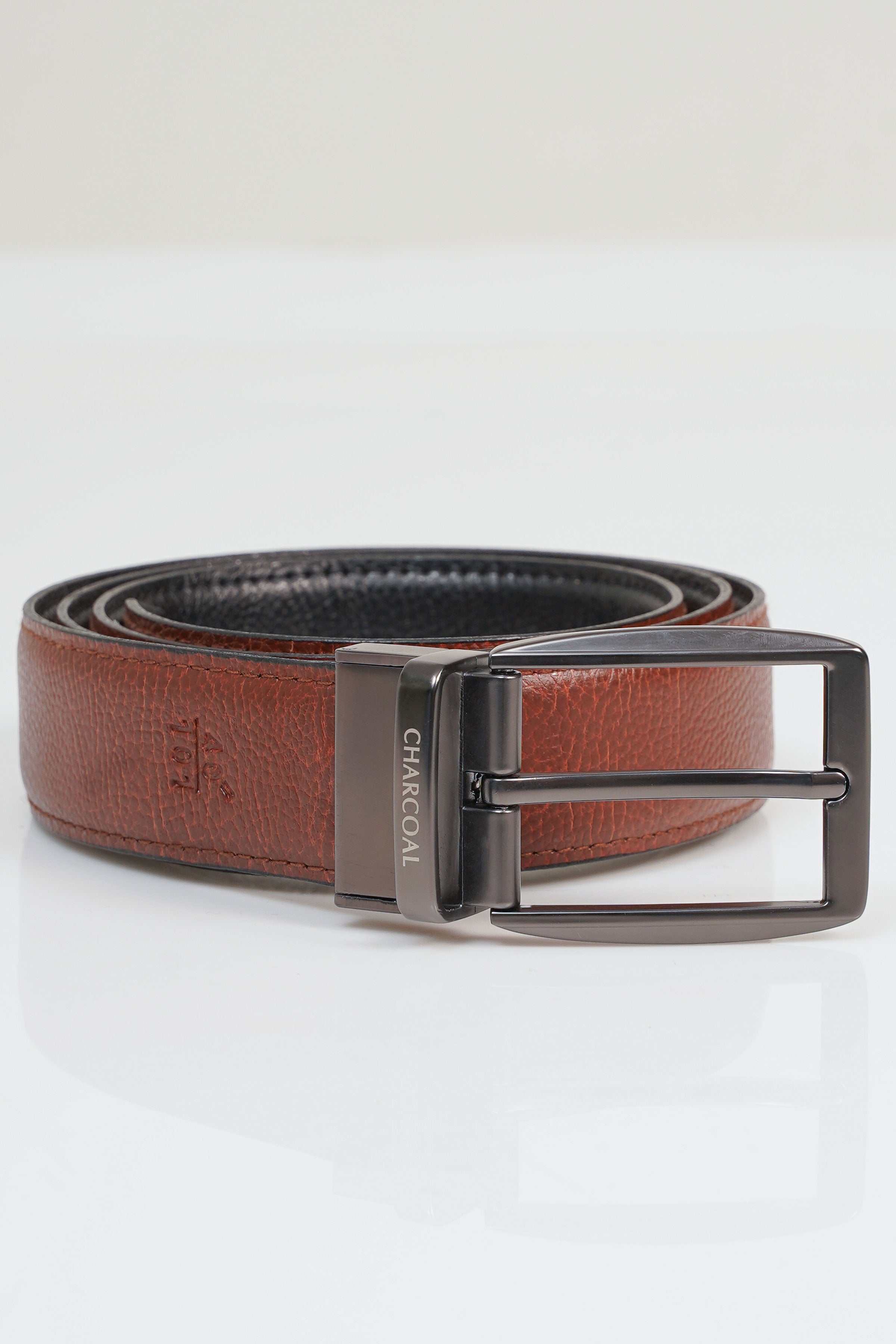Reversible leather belt with rectangular metal buckle, brown strap and embossed logo