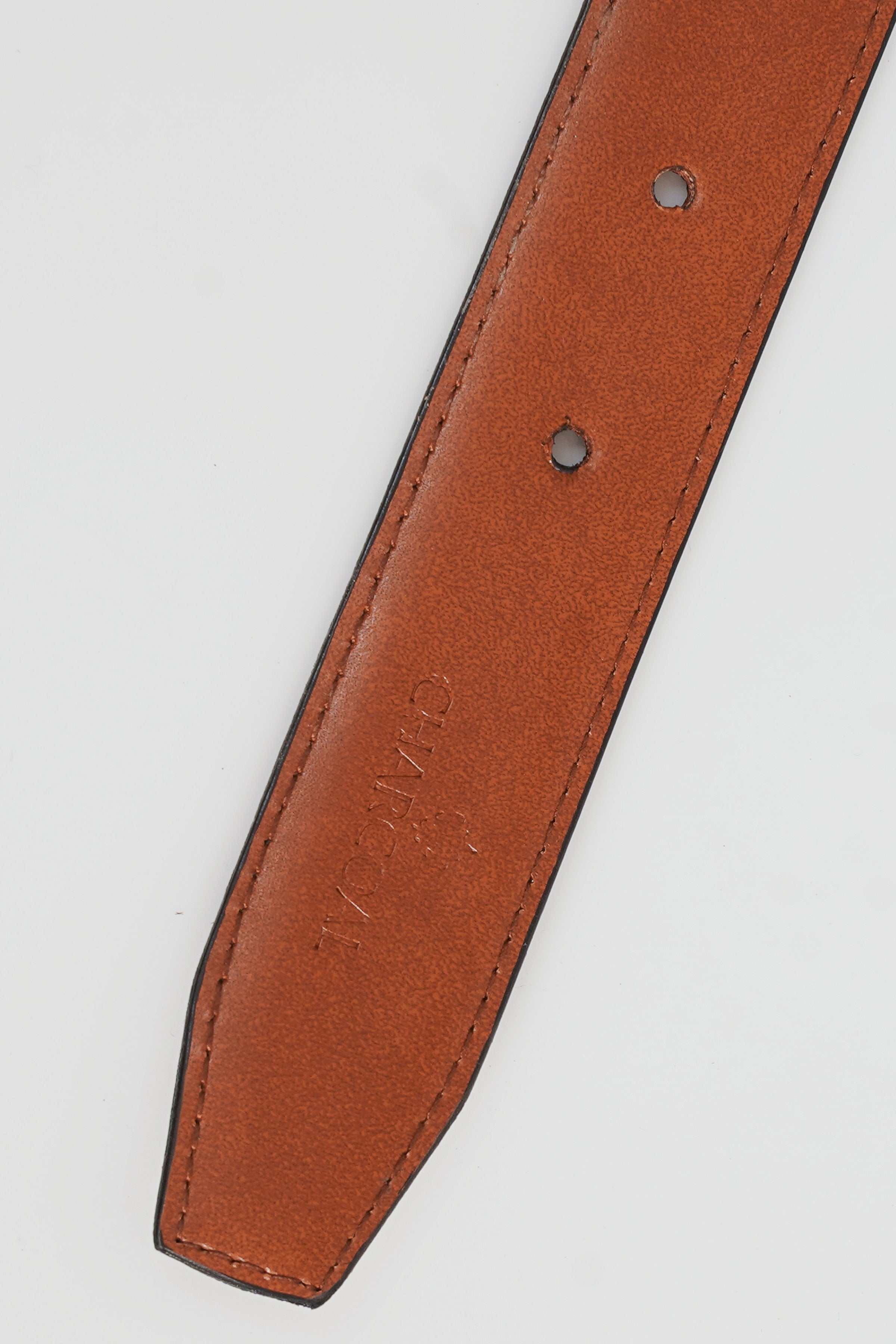 Reversible belt leather strap with embossed text and two eyelet holes
