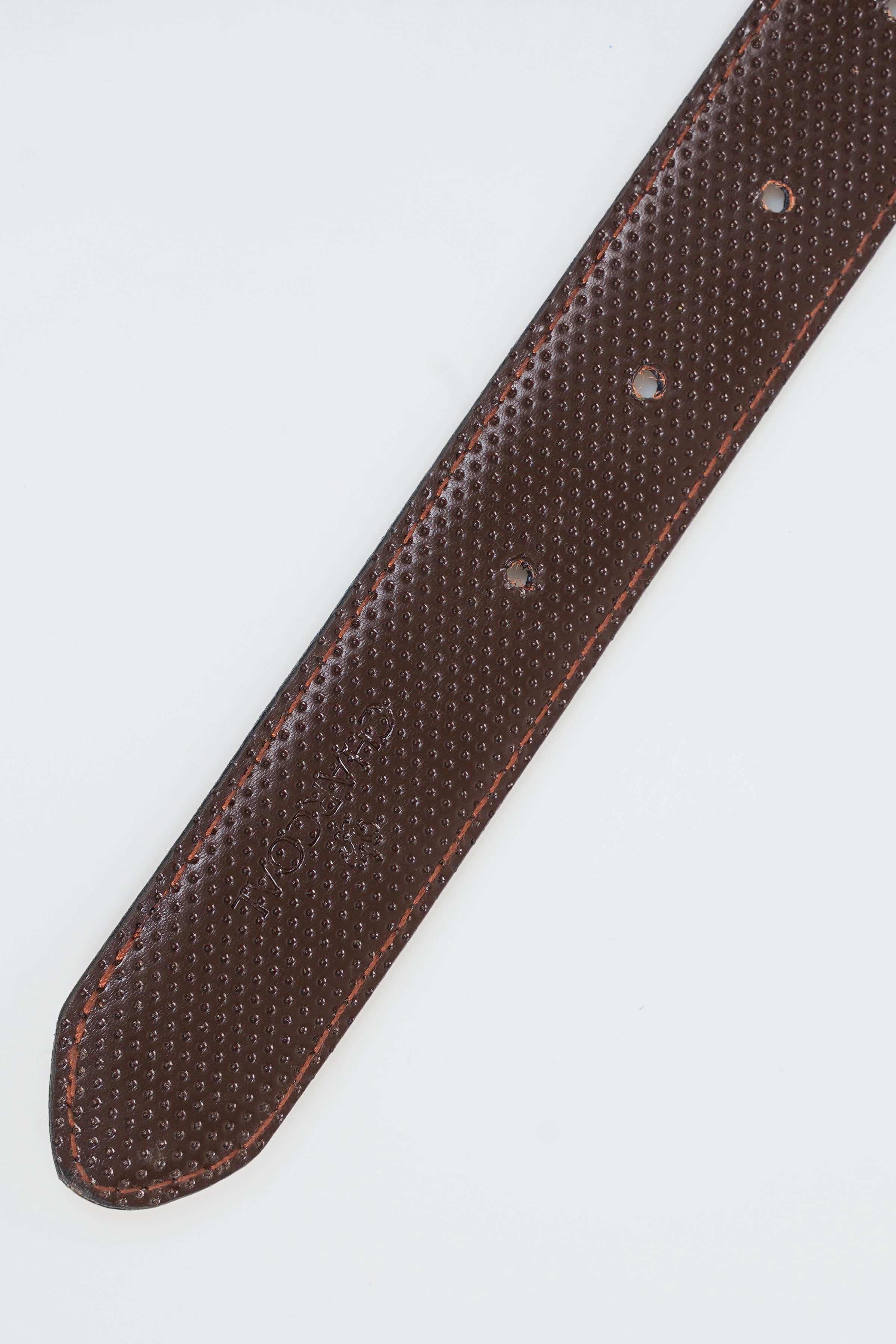 Reversible belt, dark brown textured strap with rounded end and metal rivets