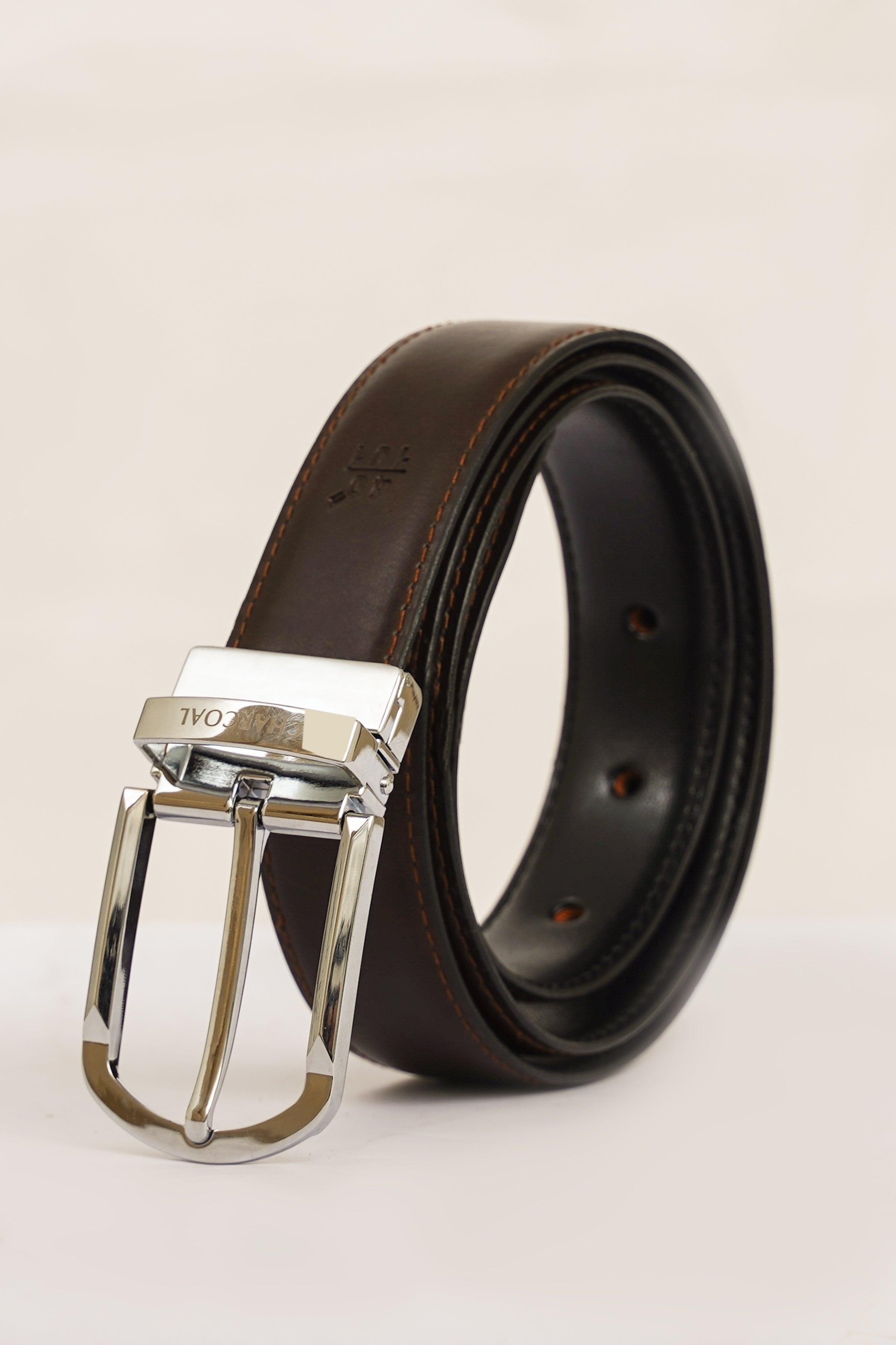 Reversible leather belt with silver-tone buckle, dark and brown sides visible
