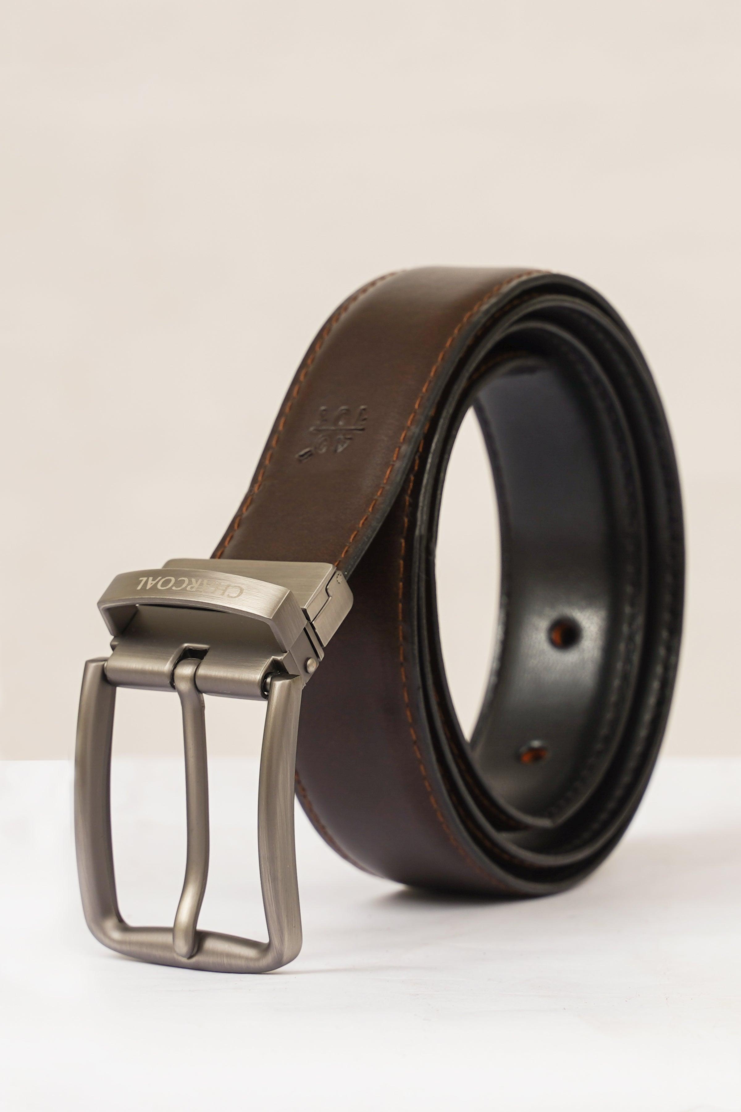 Reversible belt with silver buckle, dark brown leather and black reversible side.