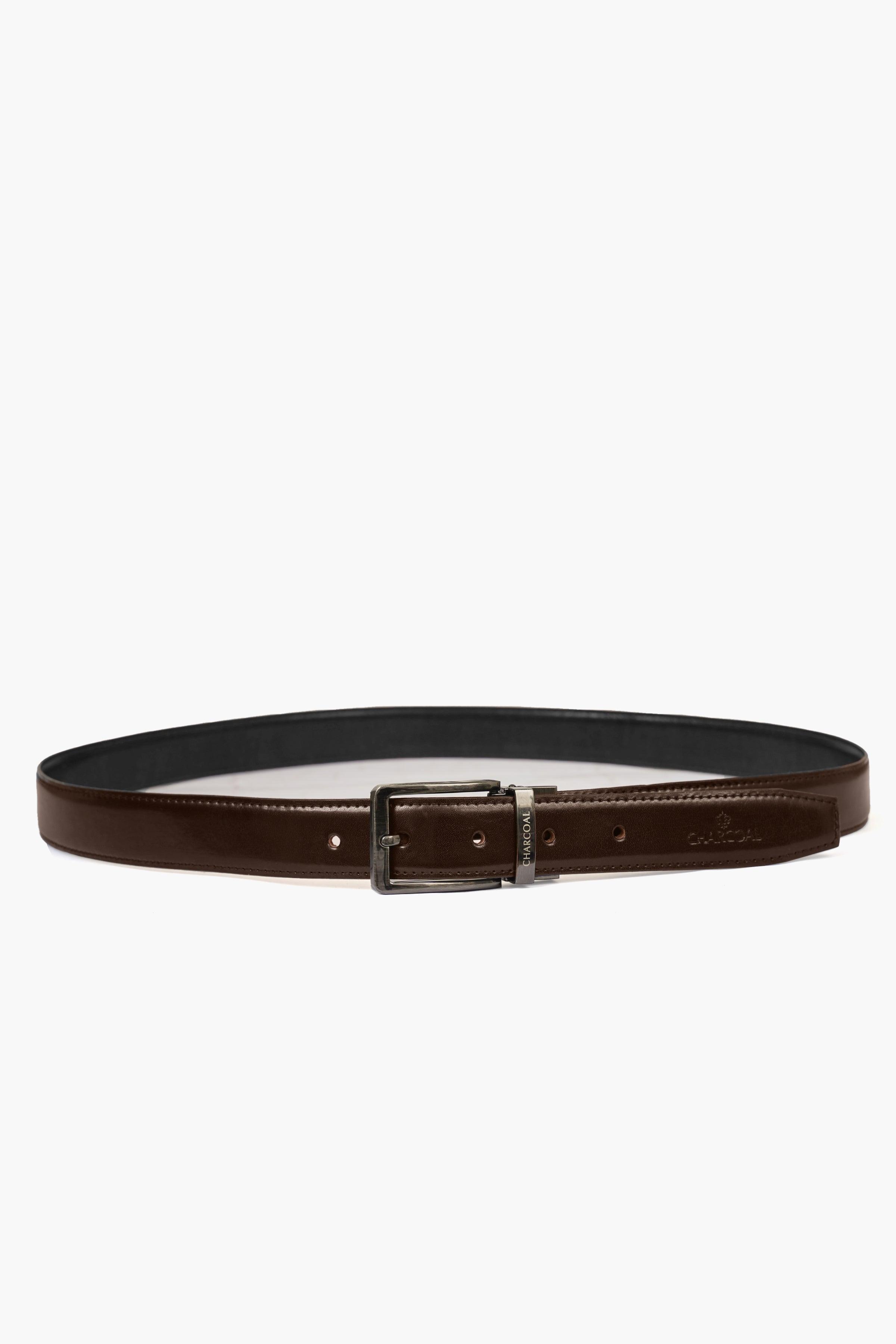 Reversible leather belt with brown strap and rectangular silver buckle