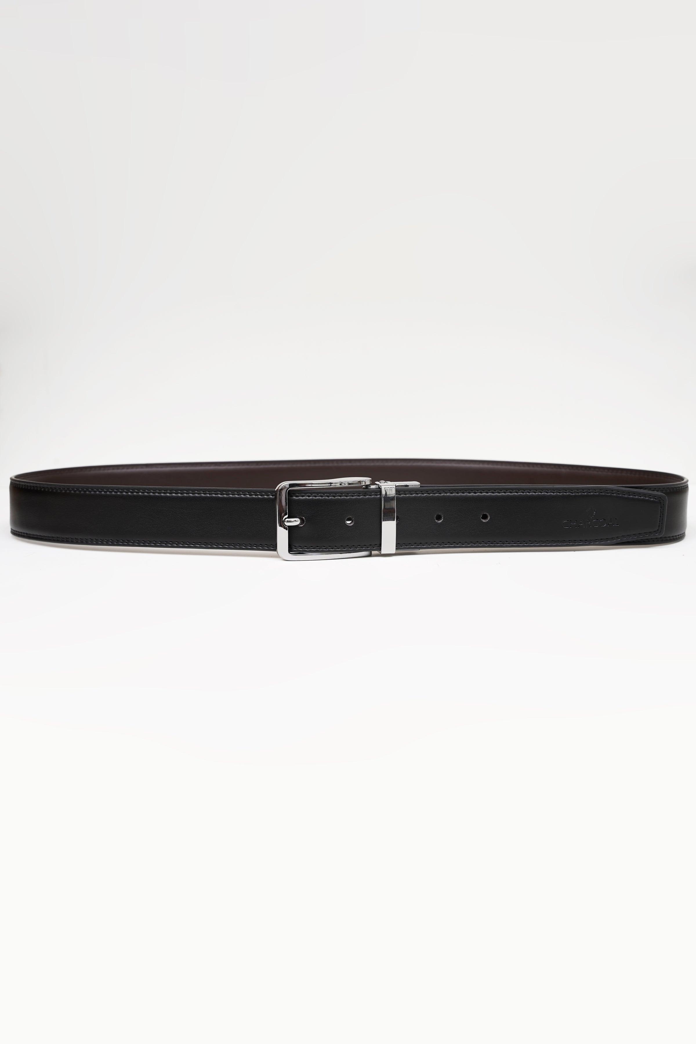 Reversible belt with silver buckle and dark strap, centered with row of holes