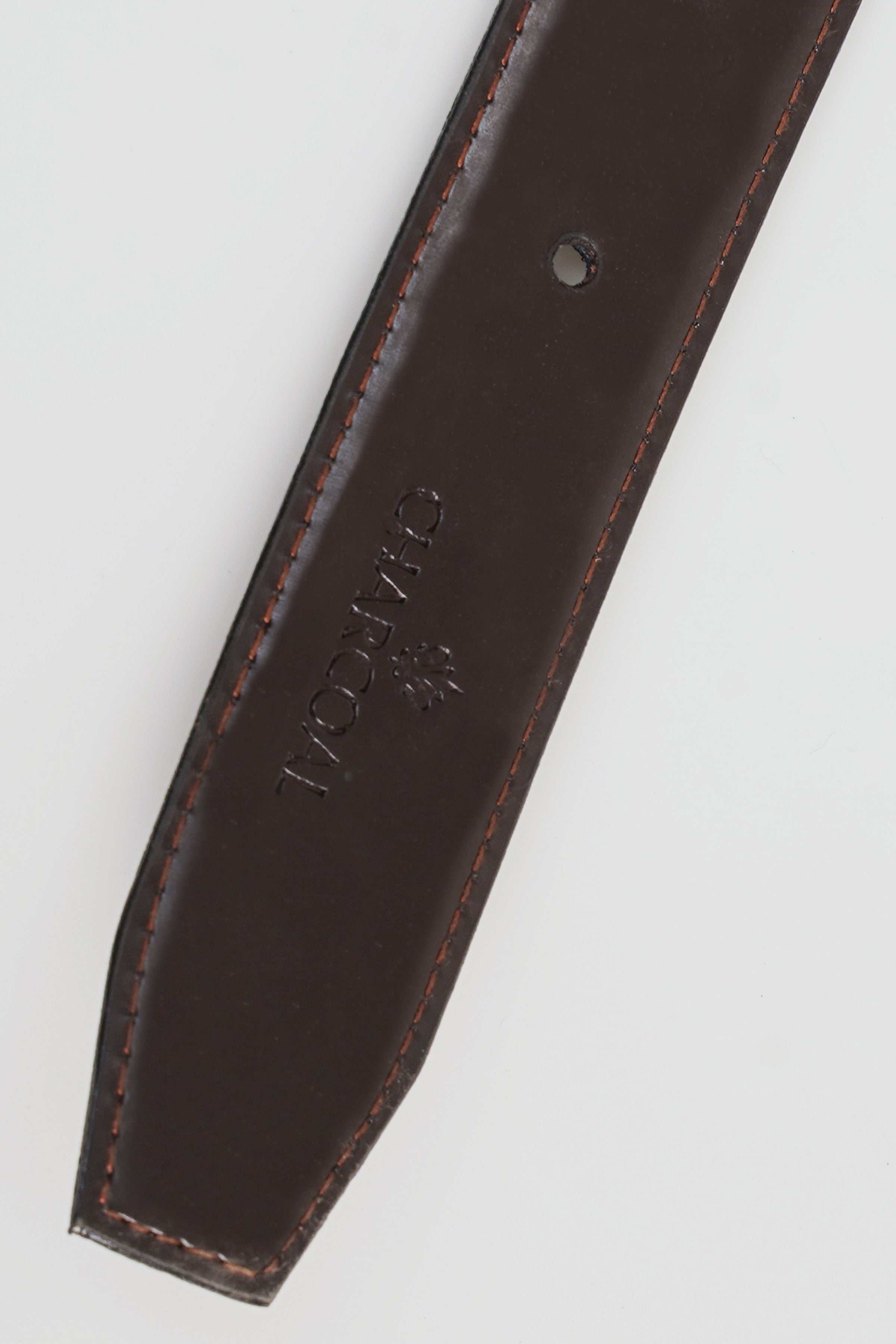Brown leather belt strap with embossed logo detail and contrast stitching