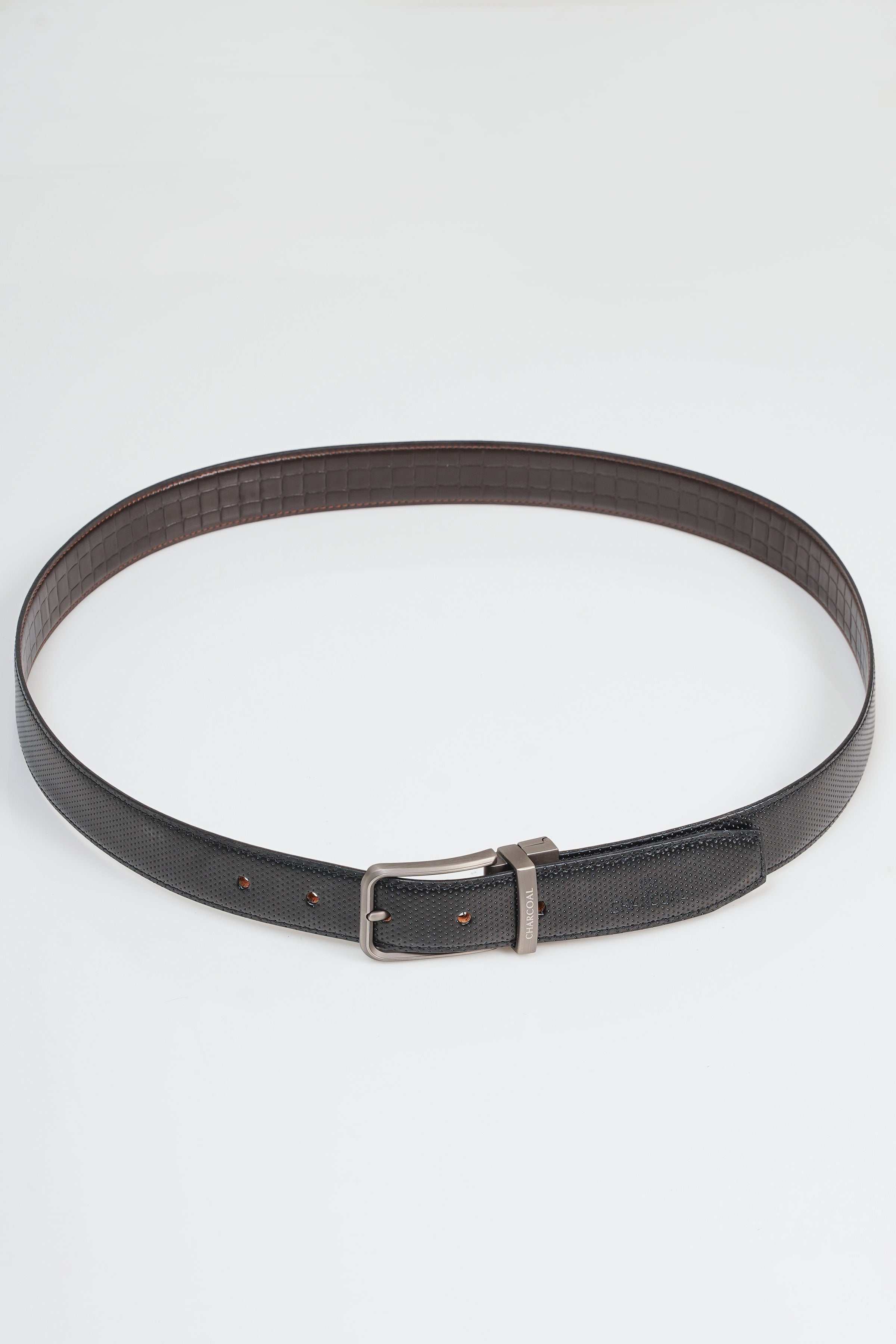 Reversible belt, dark strap with silver buckle and single row of eyelets