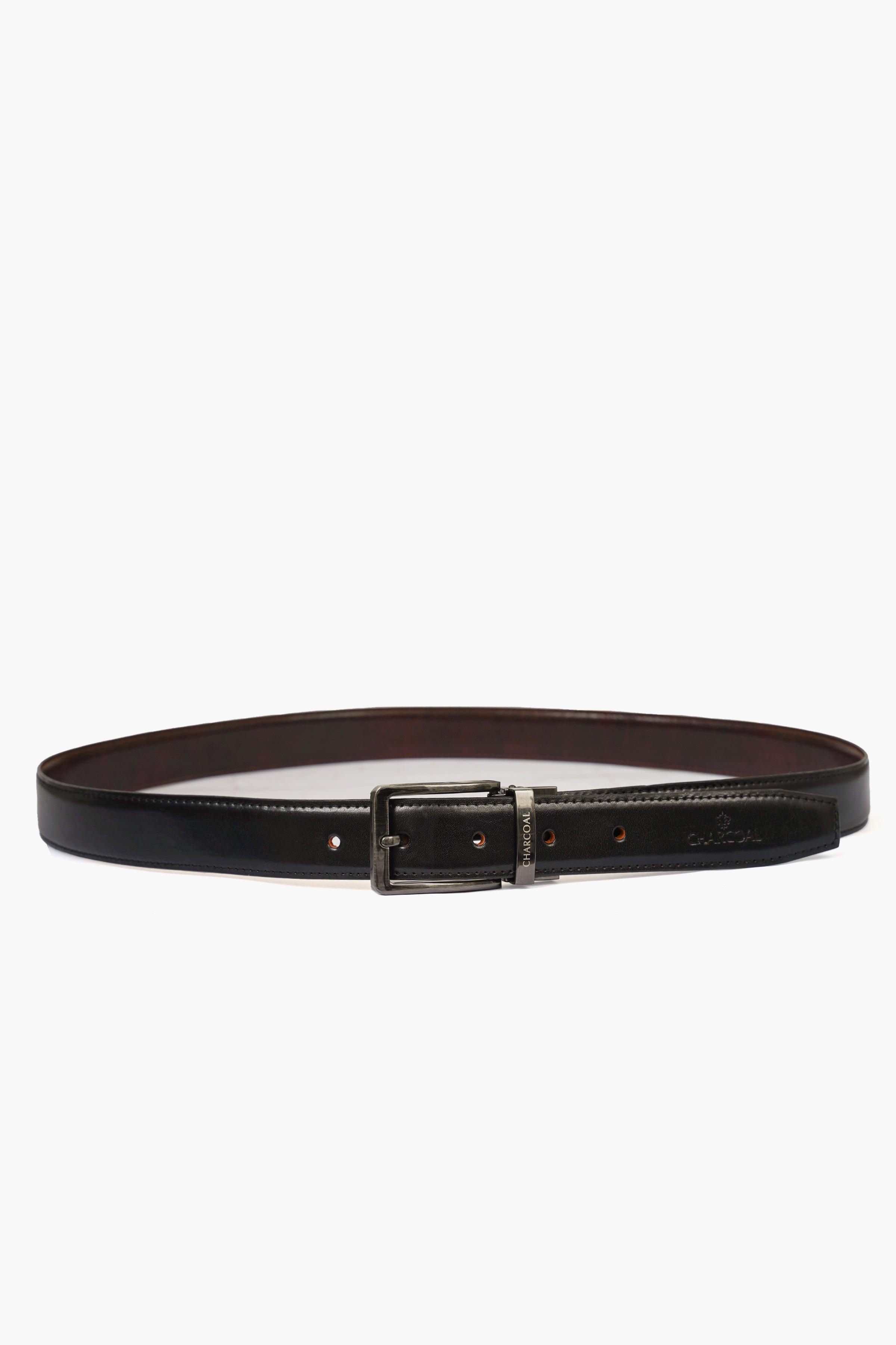 Reversible leather belt with dark strap, metal buckle bar, and punched holes