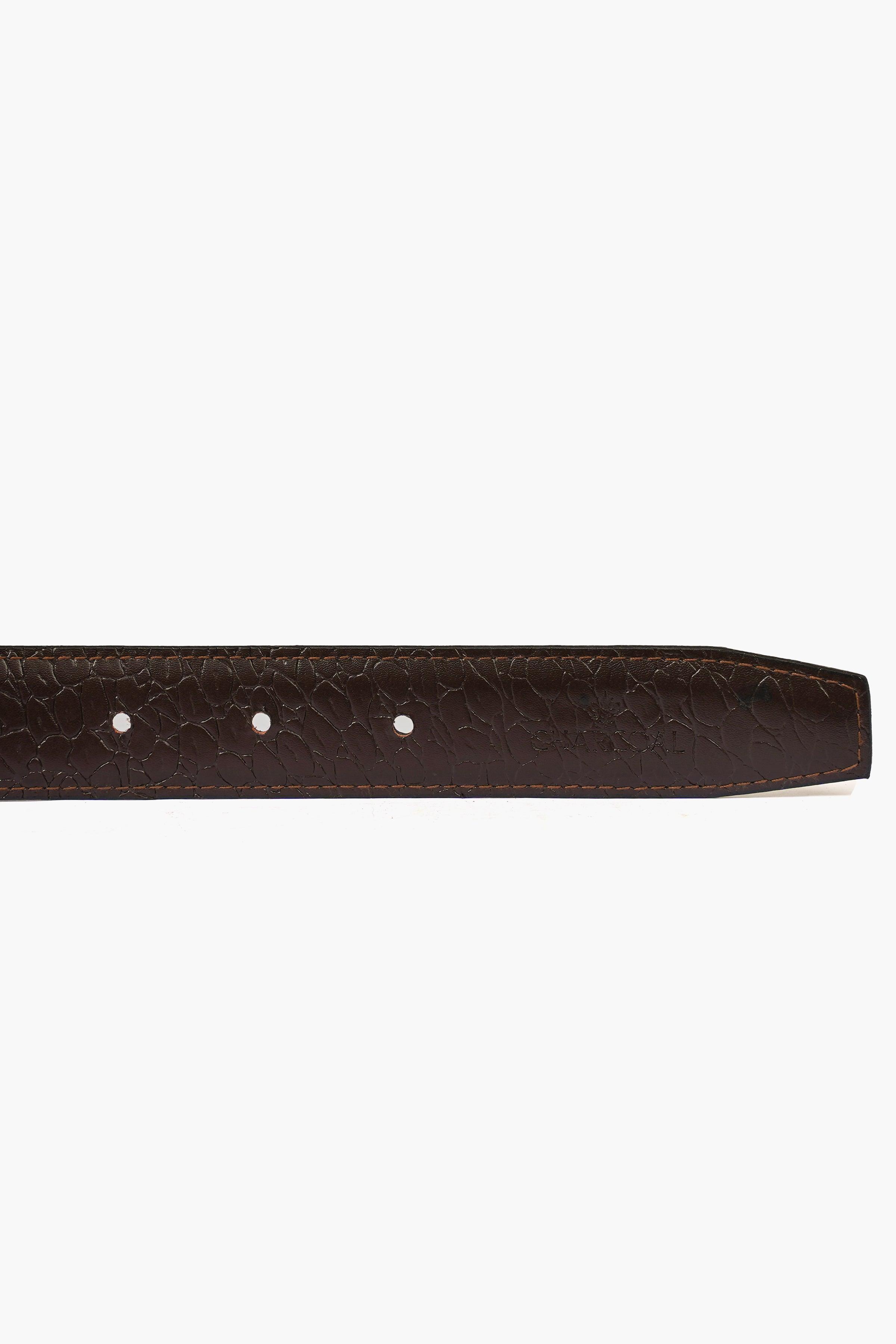 Brown belt strap with stitching and punched holes, reversible leather design