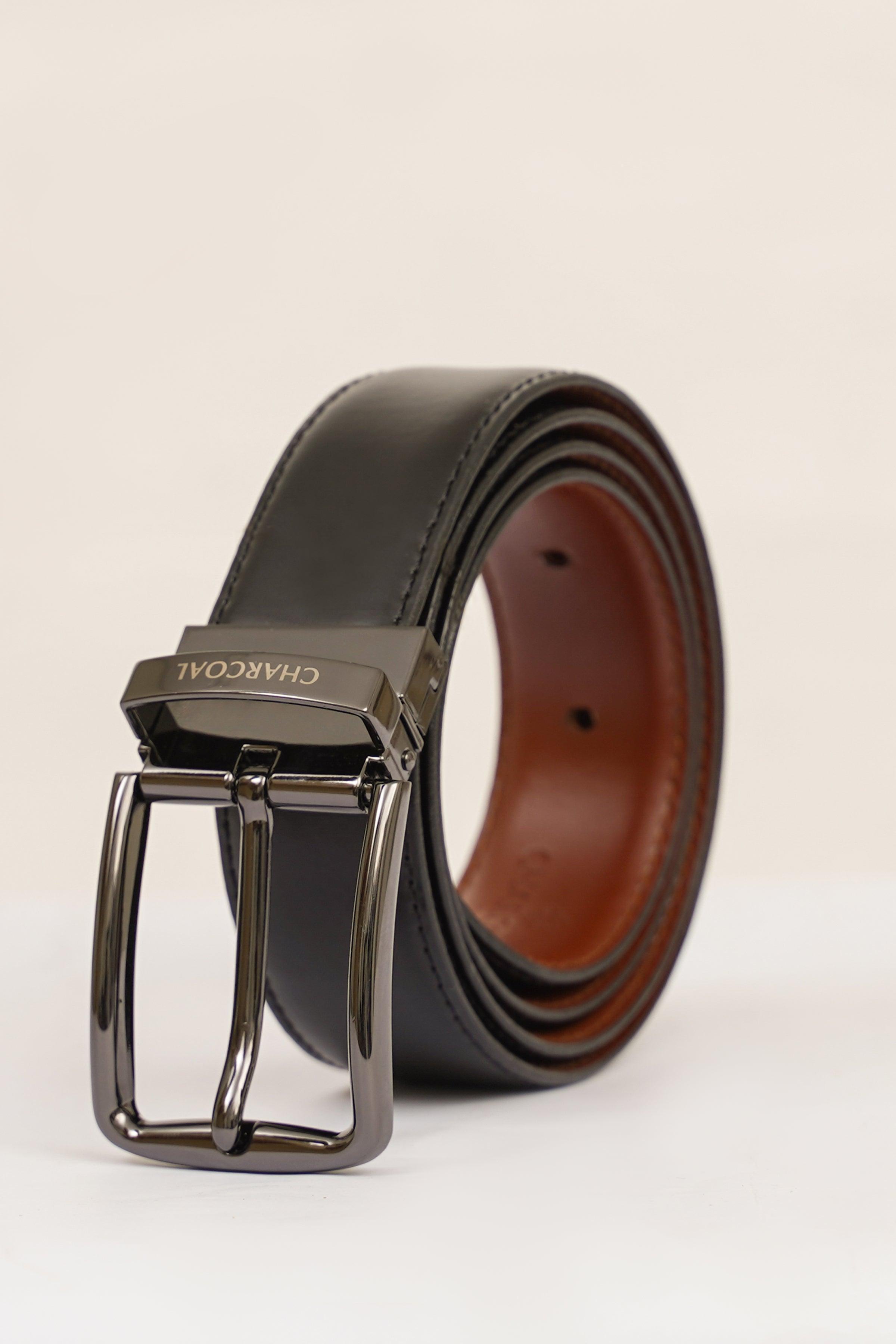 Reversible leather belt in dark charcoal with tan lining and silver prong buckle