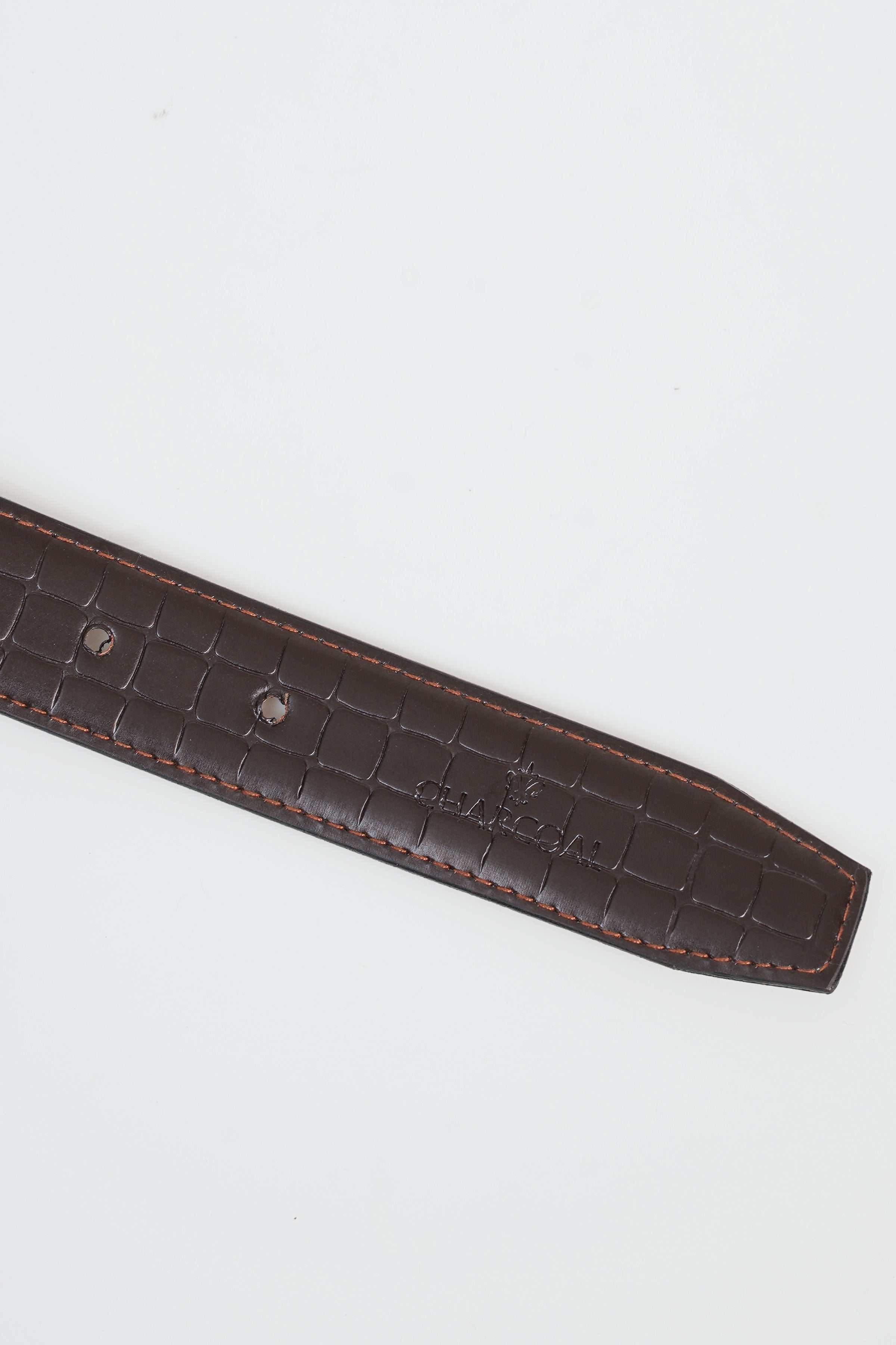 Reversible belt strap with embossed pattern and metal eyelets, dark brown