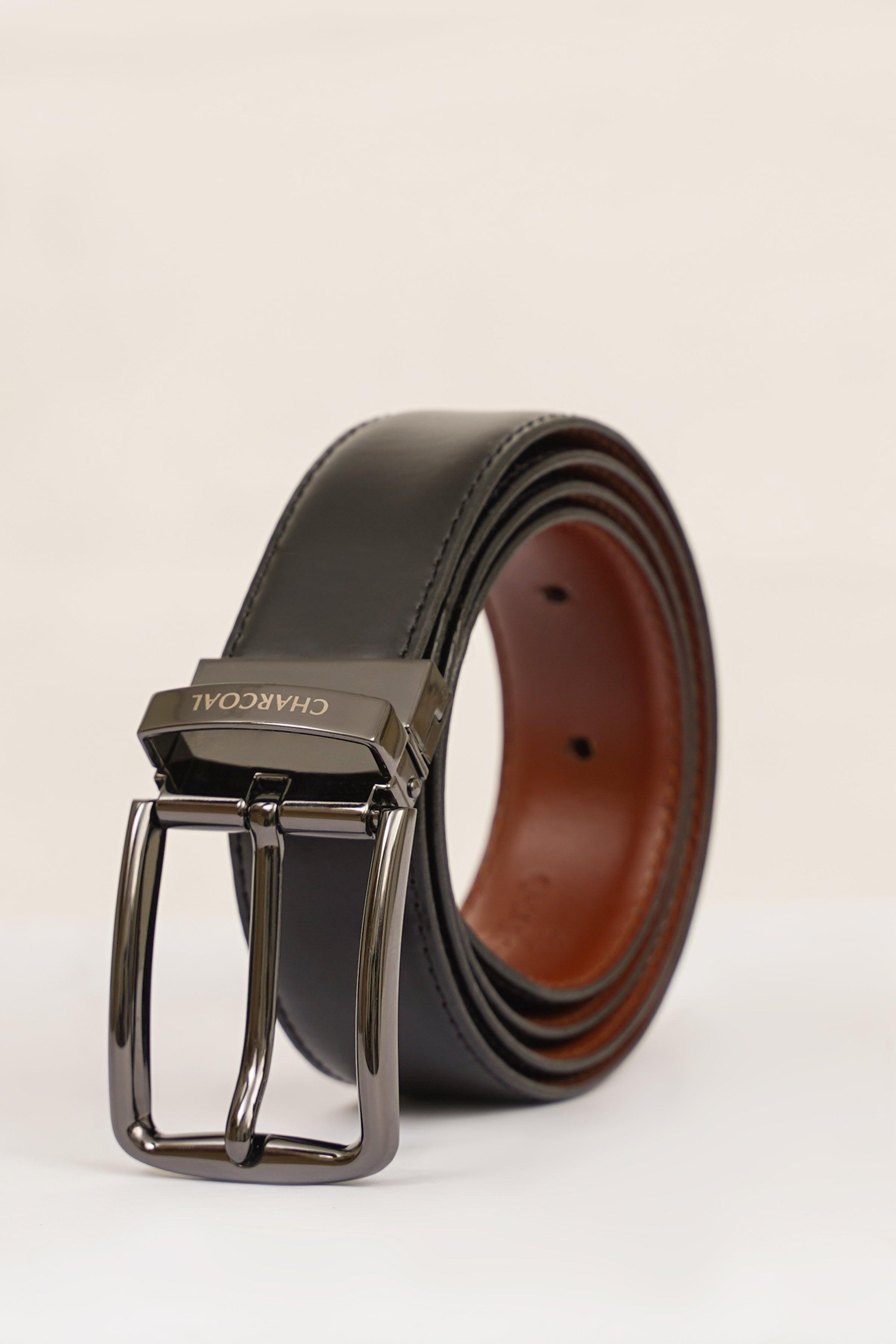 Reversible belt with silver rectangular buckle, dark leather outer and brown underside.
