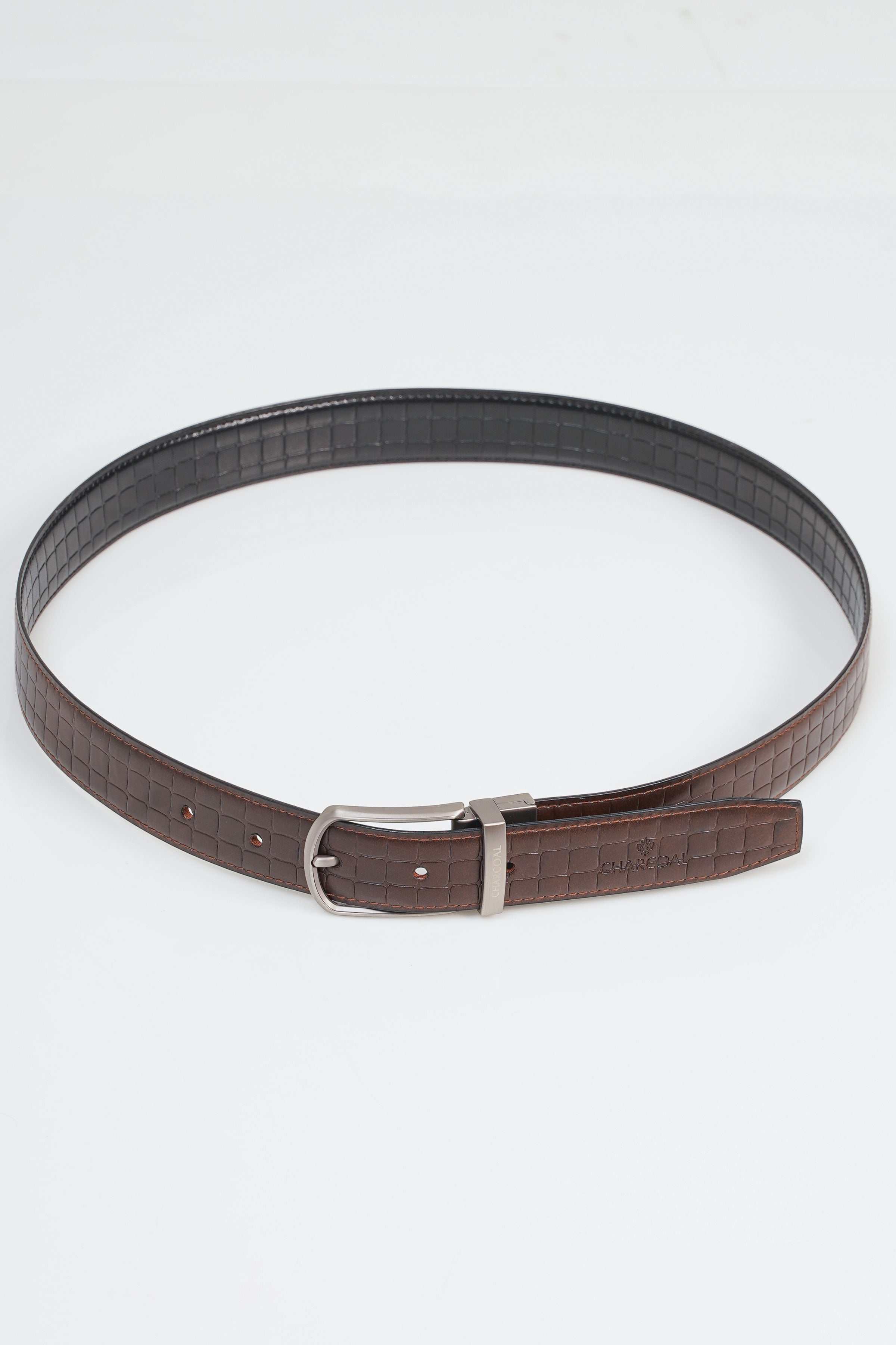 Reversible belt with brown strap, metal pin buckle, and croc texture