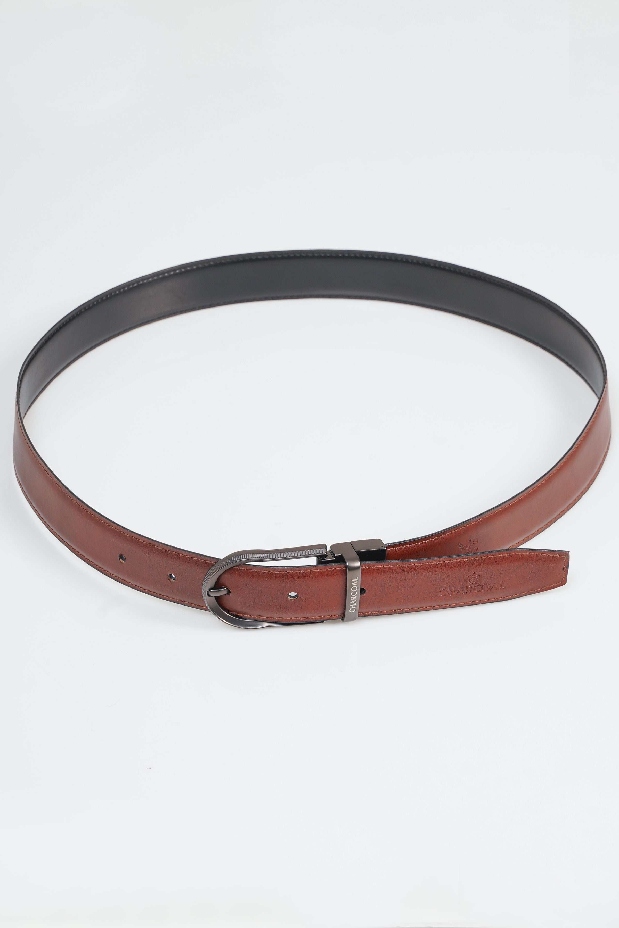 Reversible belt with dark outer and brown inner leather sides, silver-tone buckle