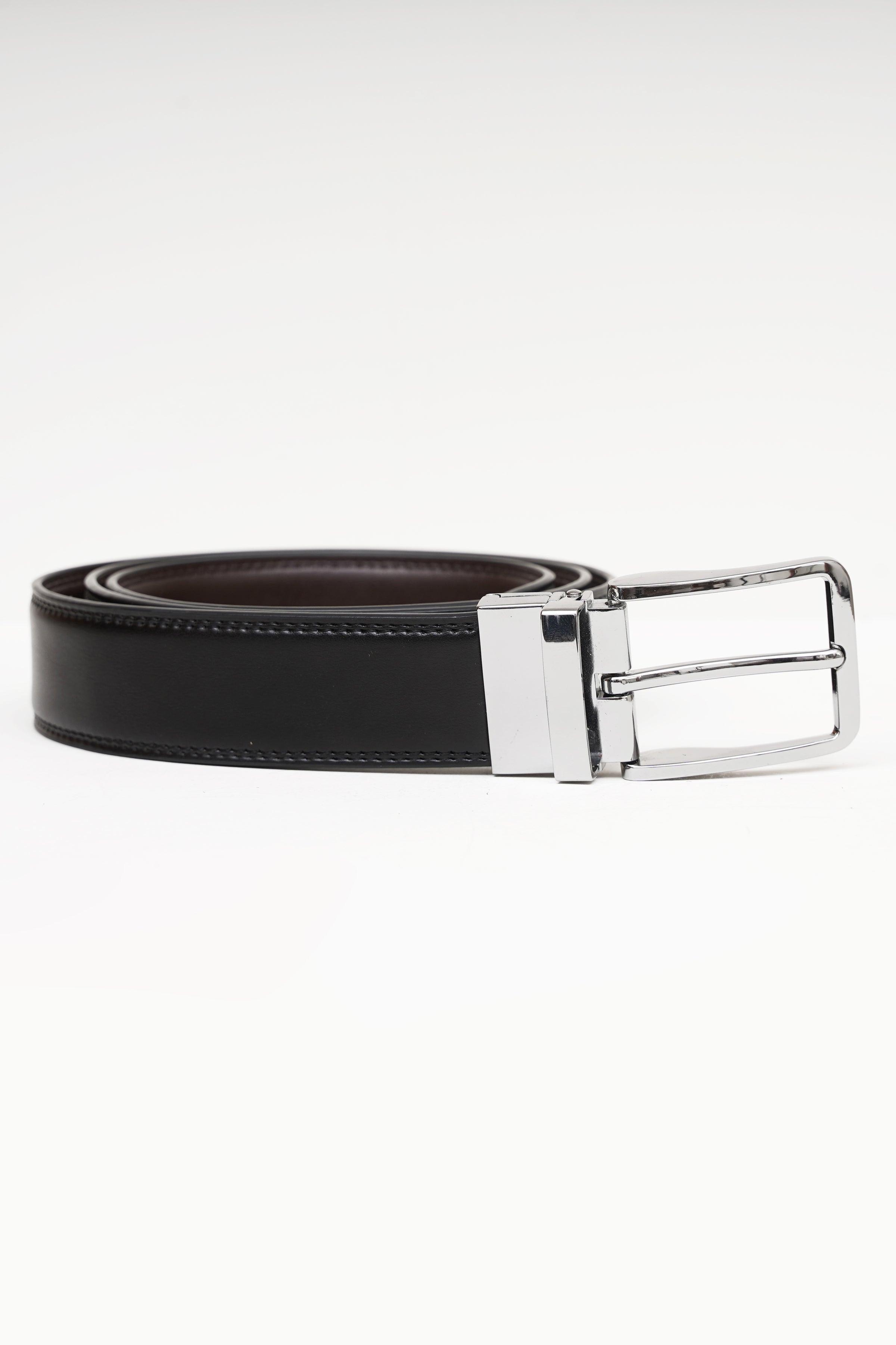 Reversible belt with silver rectangular buckle, dark strap and brown underside