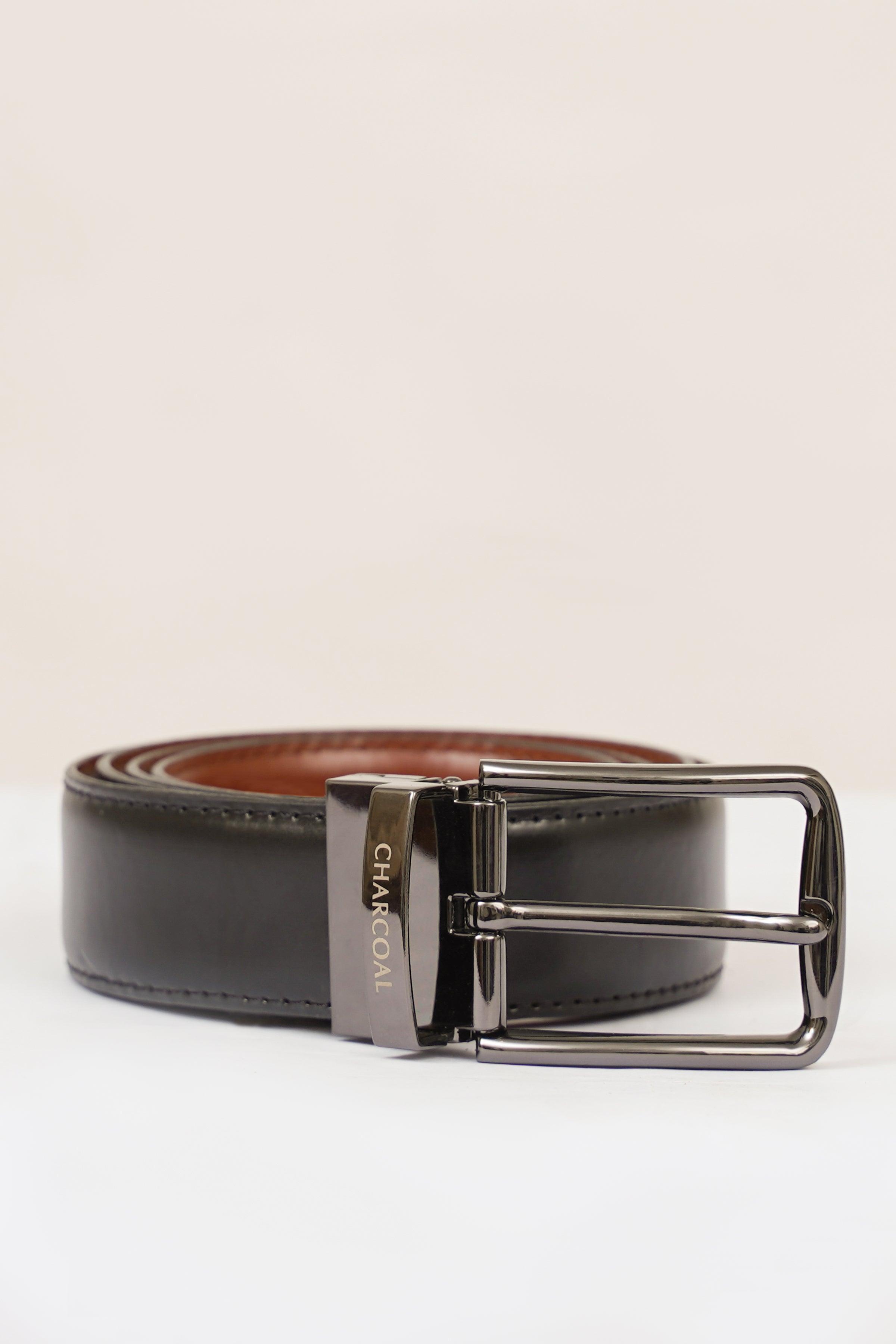 Reversible belt with charcoal outer, tan reverse, and chrome square buckle plate