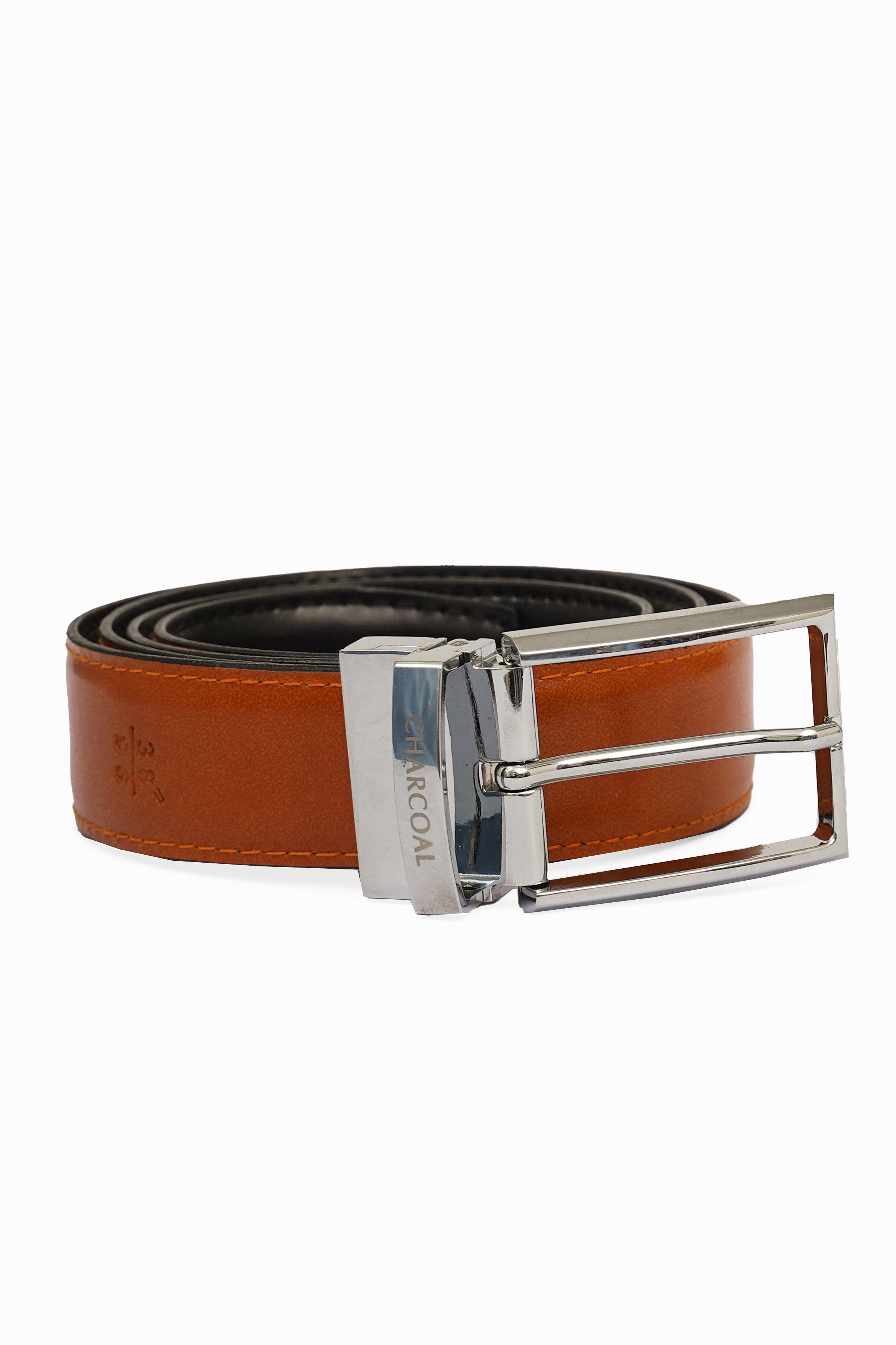 Reversible belt rolled with orange top, black lining, silver rectangular buckle