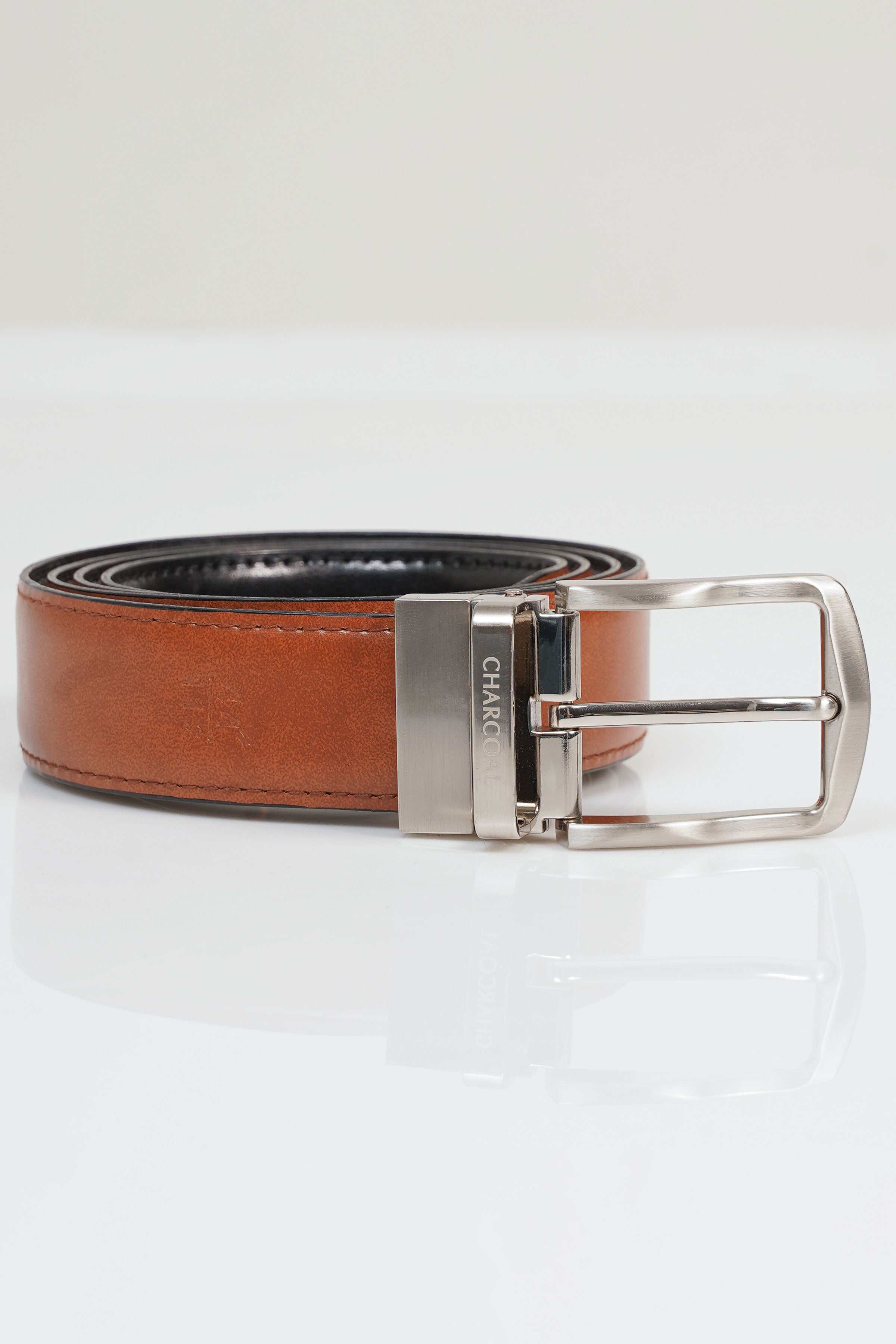 Reversible belt with brown leather, reversible strap, and silver-tone buckle