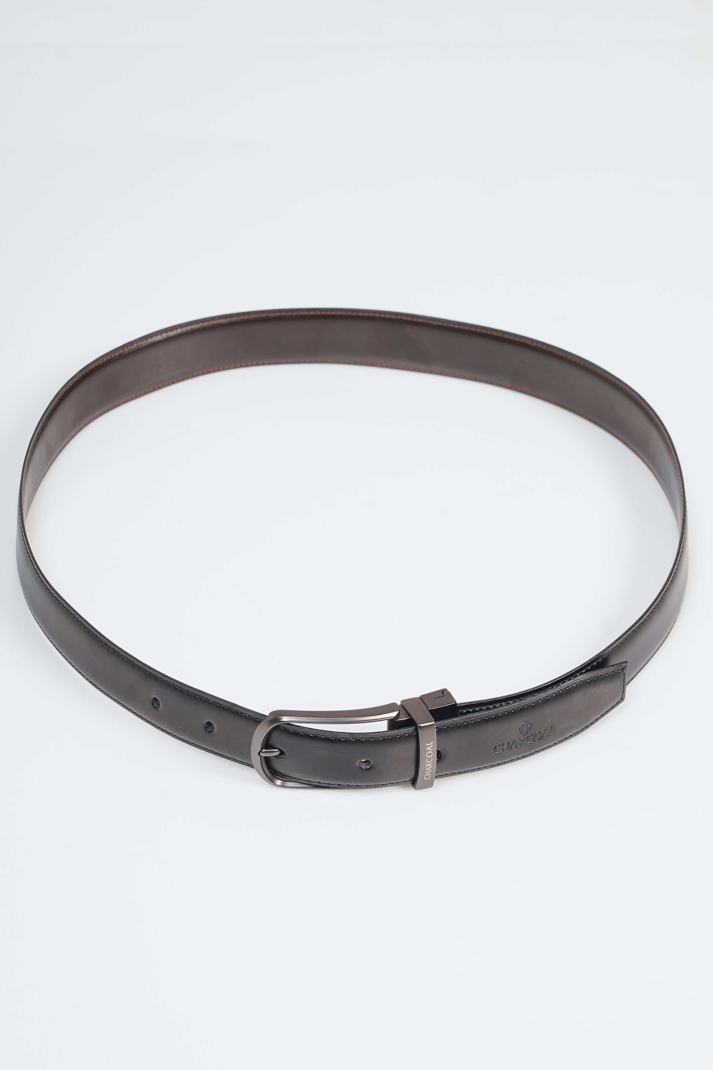 Brown leather belt with silver buckle and adjustable eyeholes