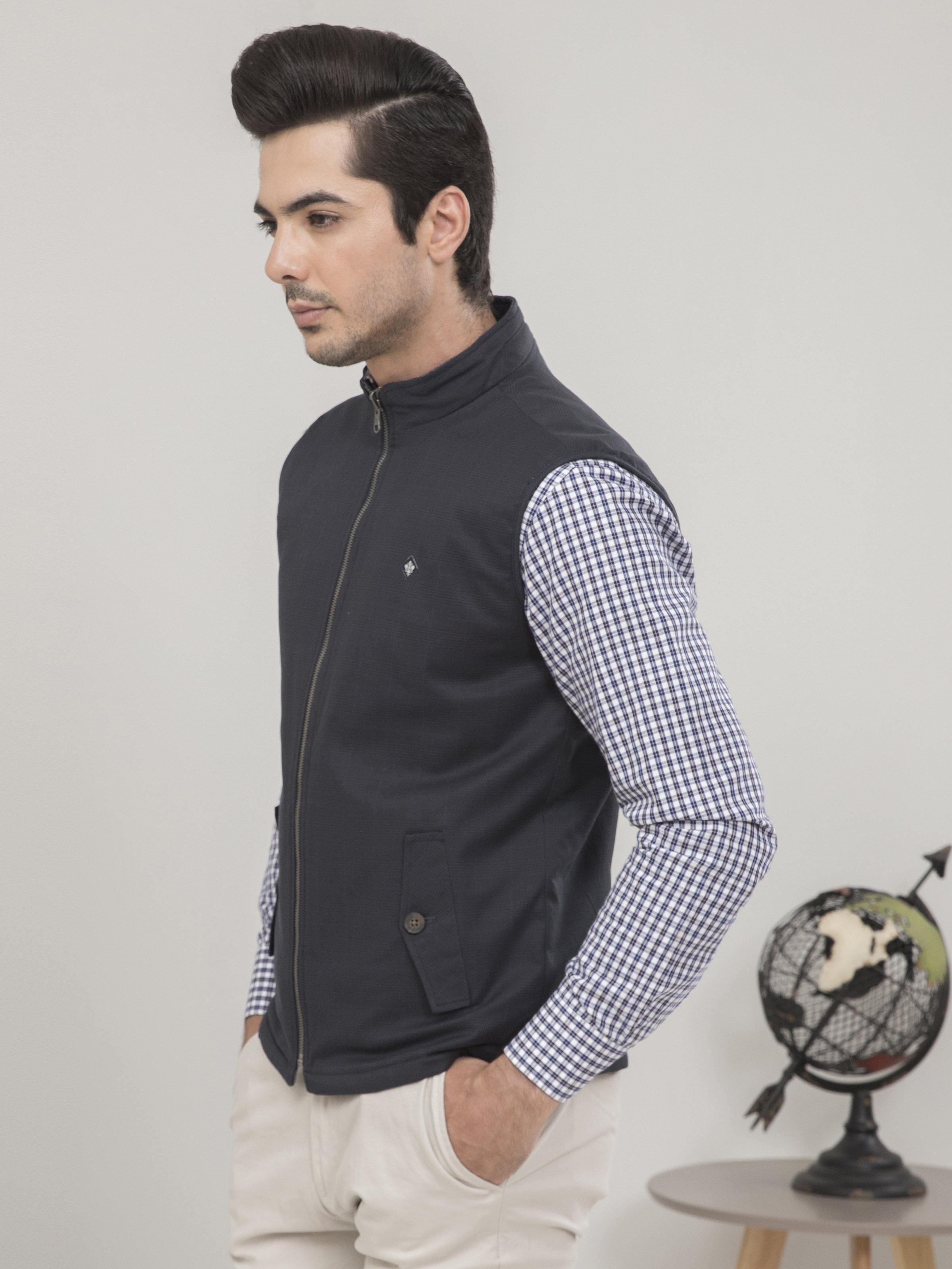 Charcoal black zip-up sleeveless vest with chest pocket detail