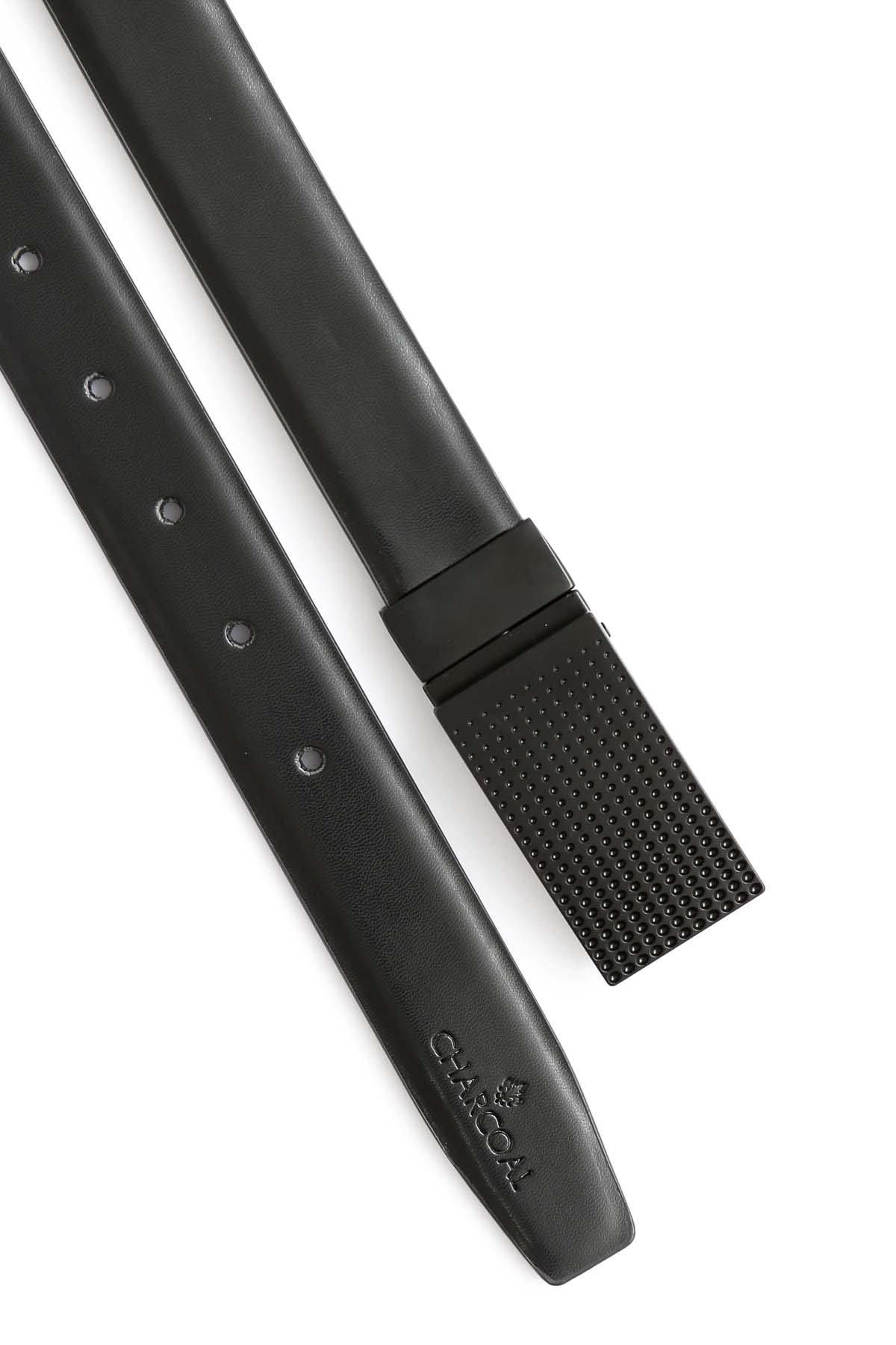 Dark leather belt strap with perforated end and metal keeper, angled view