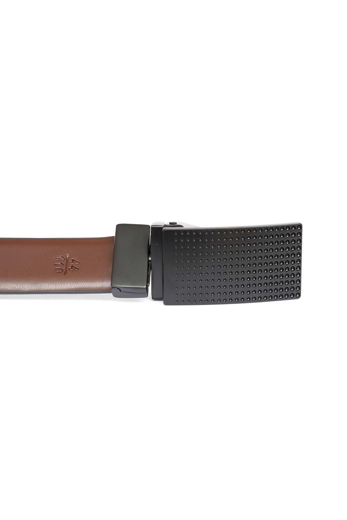 Reversible belt with brown smooth leather side, black perforated side, metal buckle