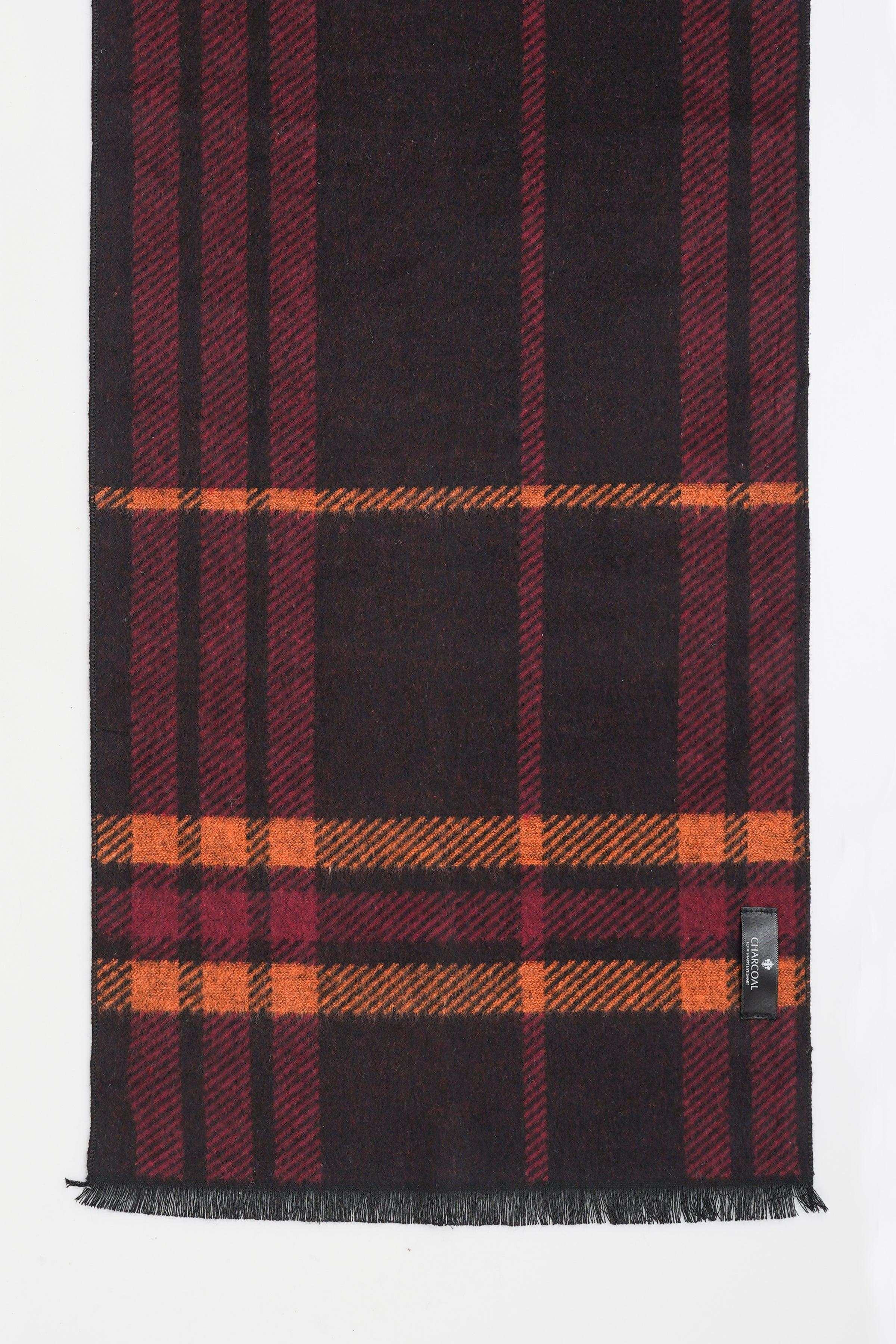 Plaid scarf in dark navy, burgundy, and orange with fringe ends