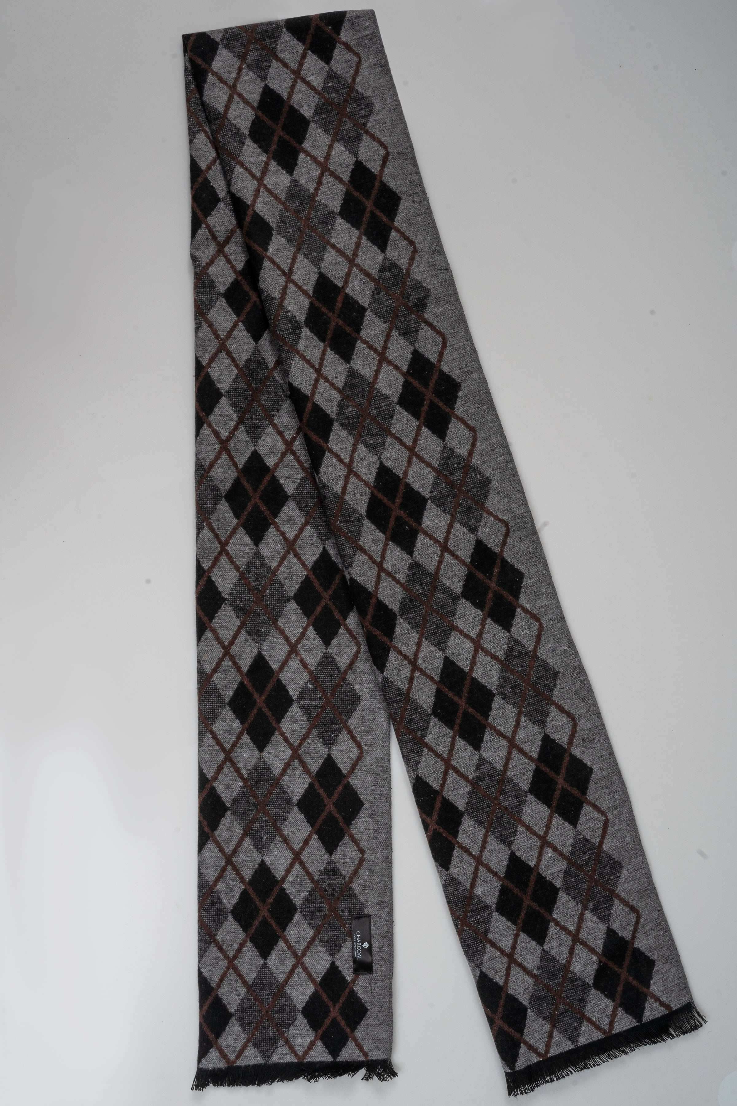 Grey scarf with long argyle diamond pattern and dark check accents
