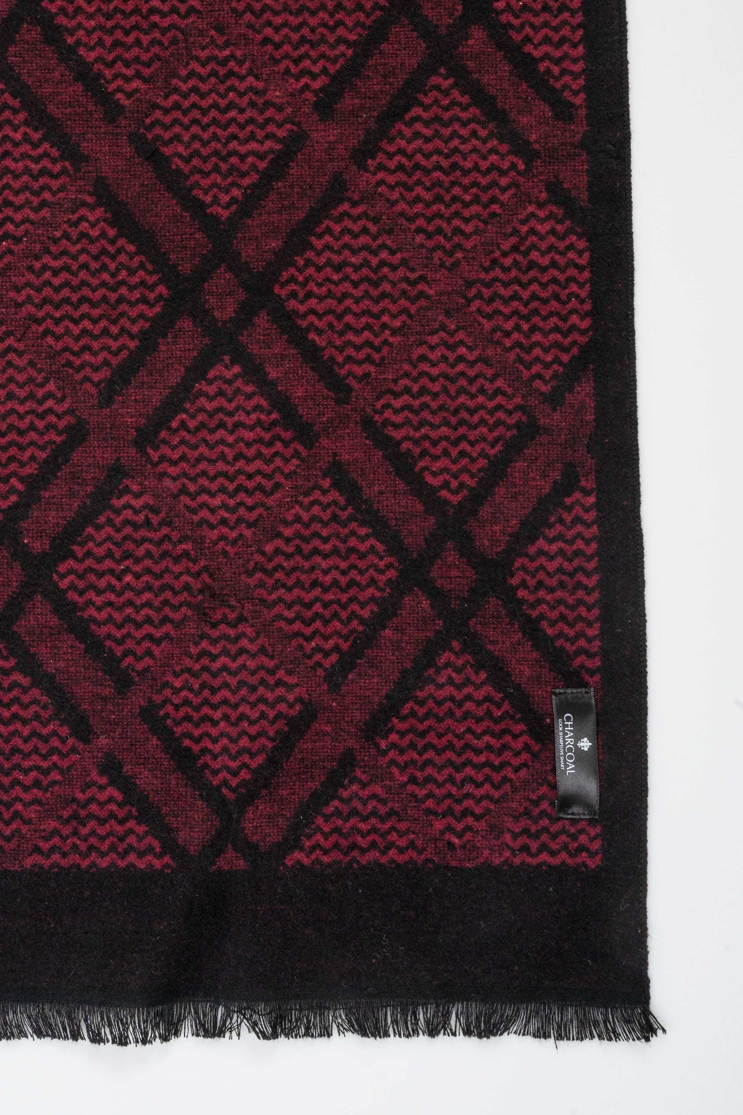 Burgundy scarf panel with black diamond grid pattern; woven edge fringe
