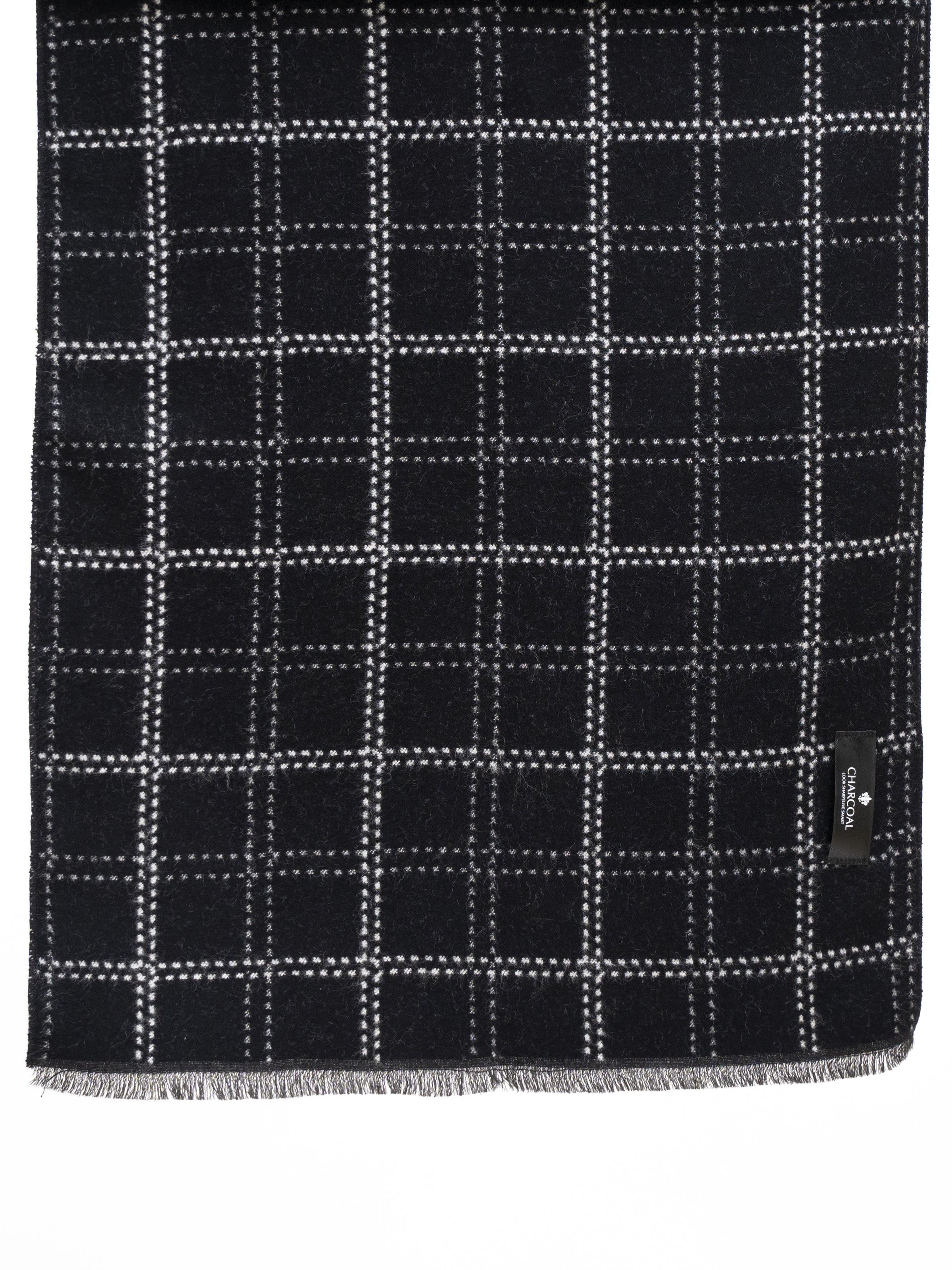 Scarf with black-and-white grid plaid and fringed hem, with small tag.