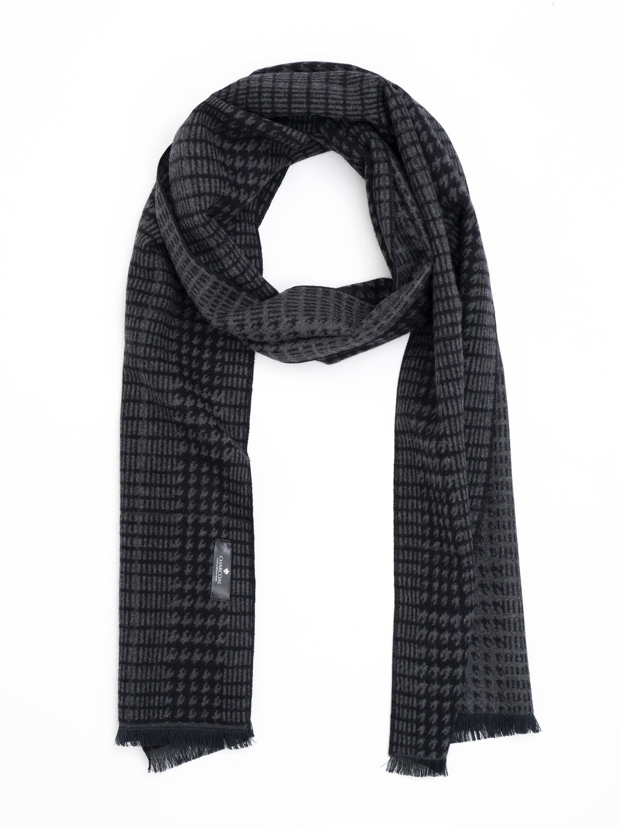 Scarf in dark charcoal with subtle check pattern and fringed ends