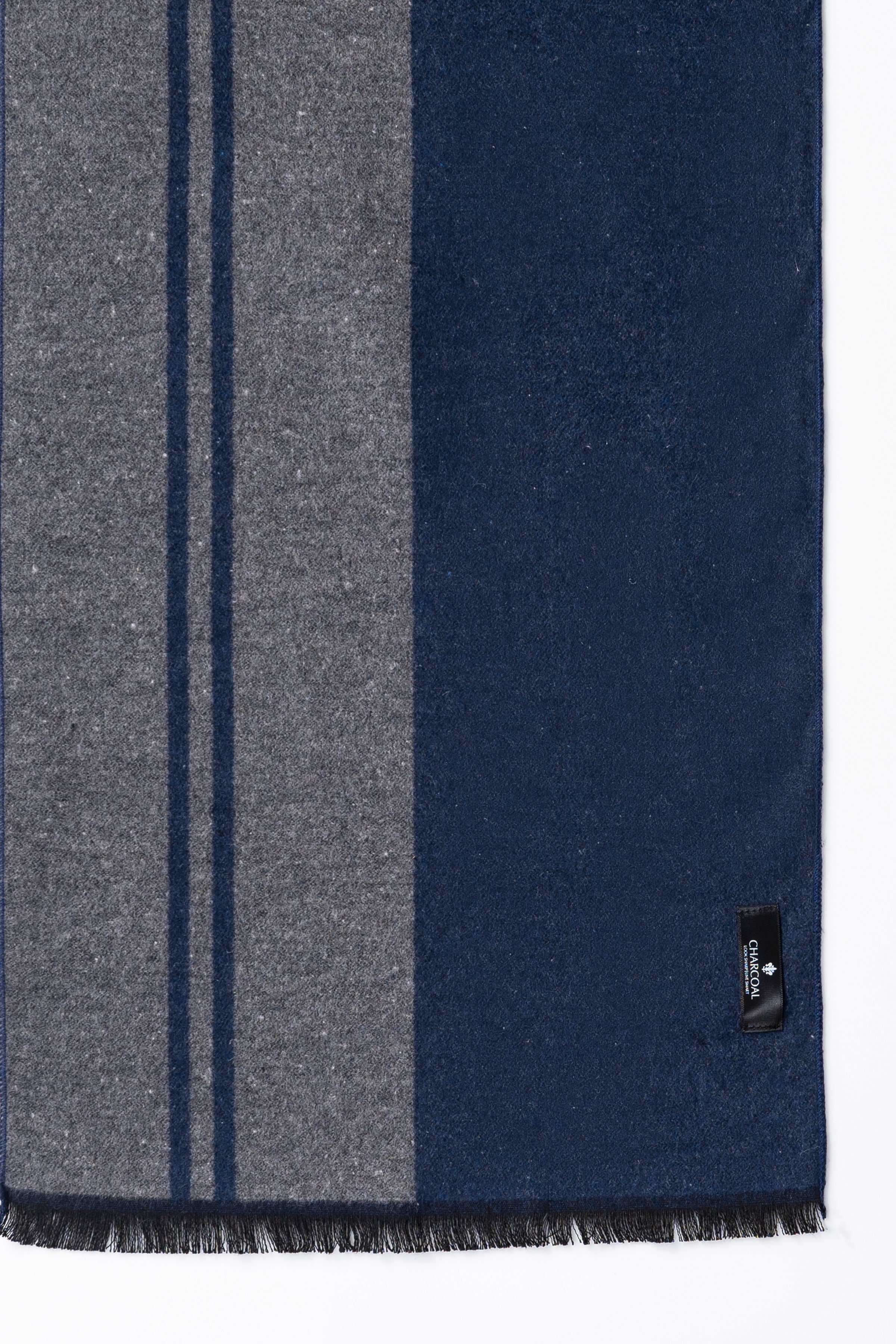 Navy and gray scarf close-up with vertical stripe and fringed hem