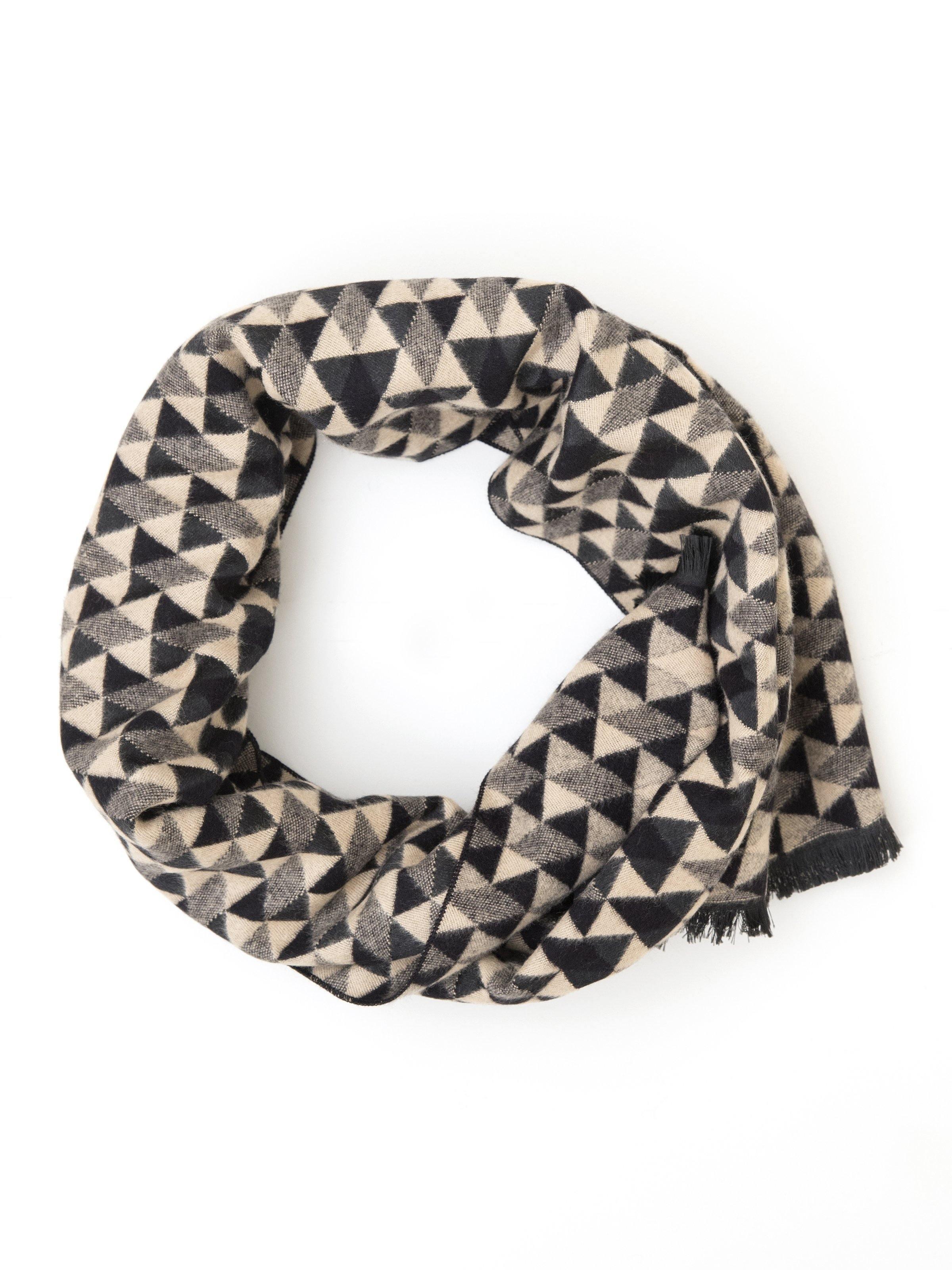 Scarf with black, gray, and cream geometric triangle pattern and fringe ends.
