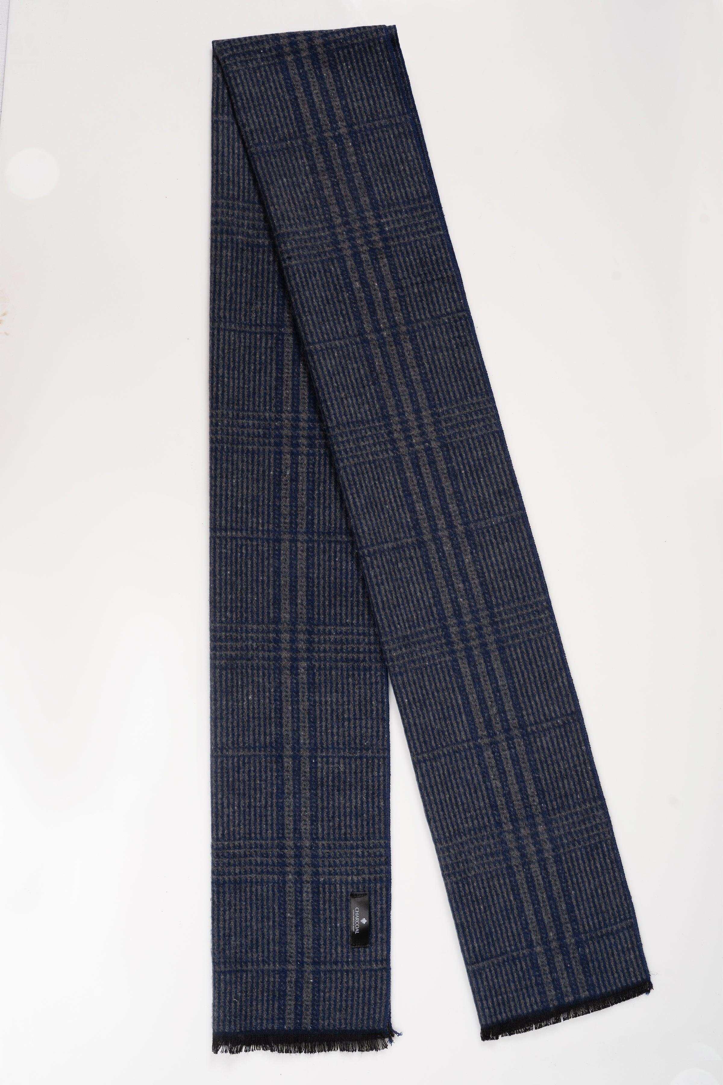 Navy plaid scarf with fringed ends and woven texture