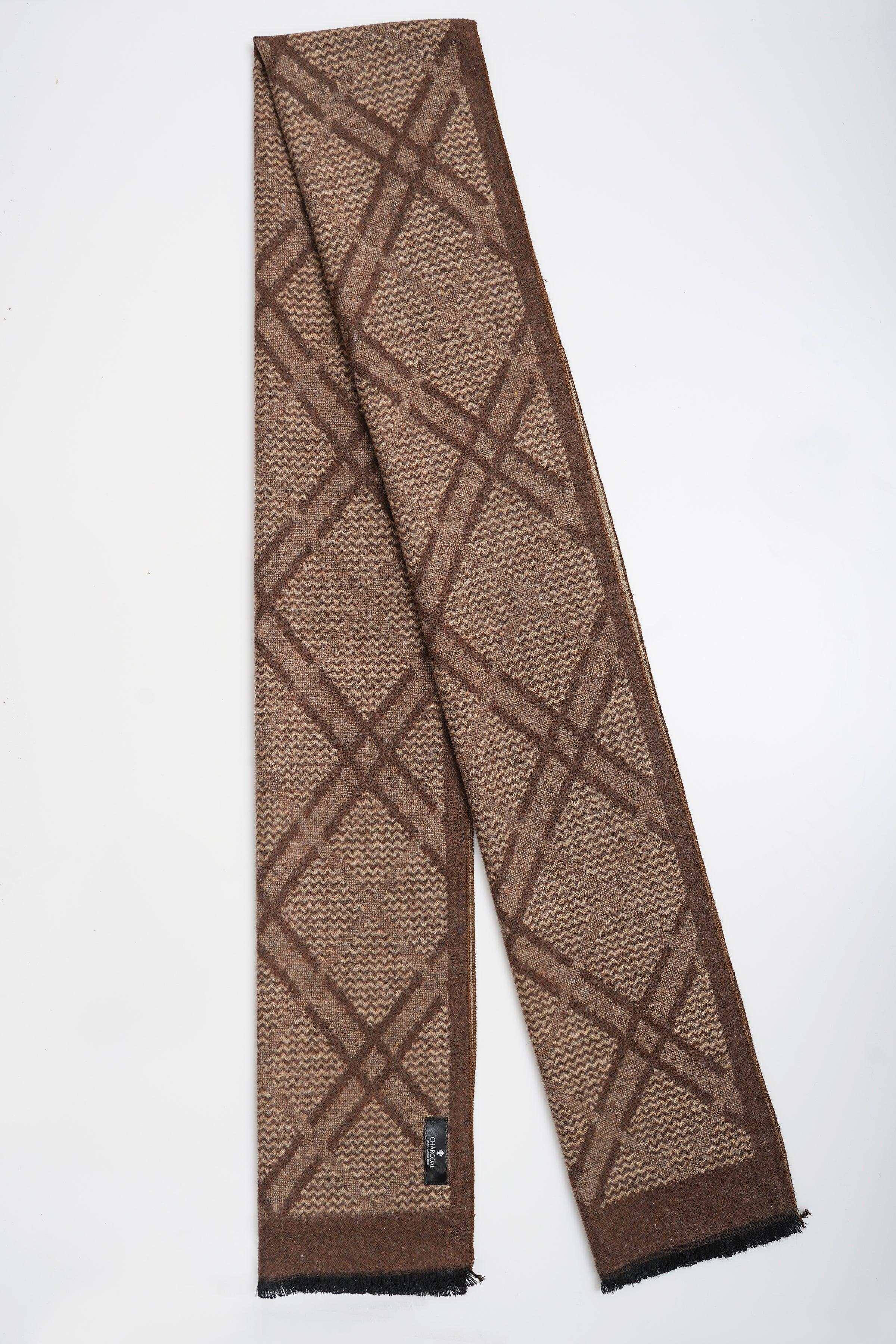 Brown scarf with repeating diamond knit pattern and fringed ends, folded