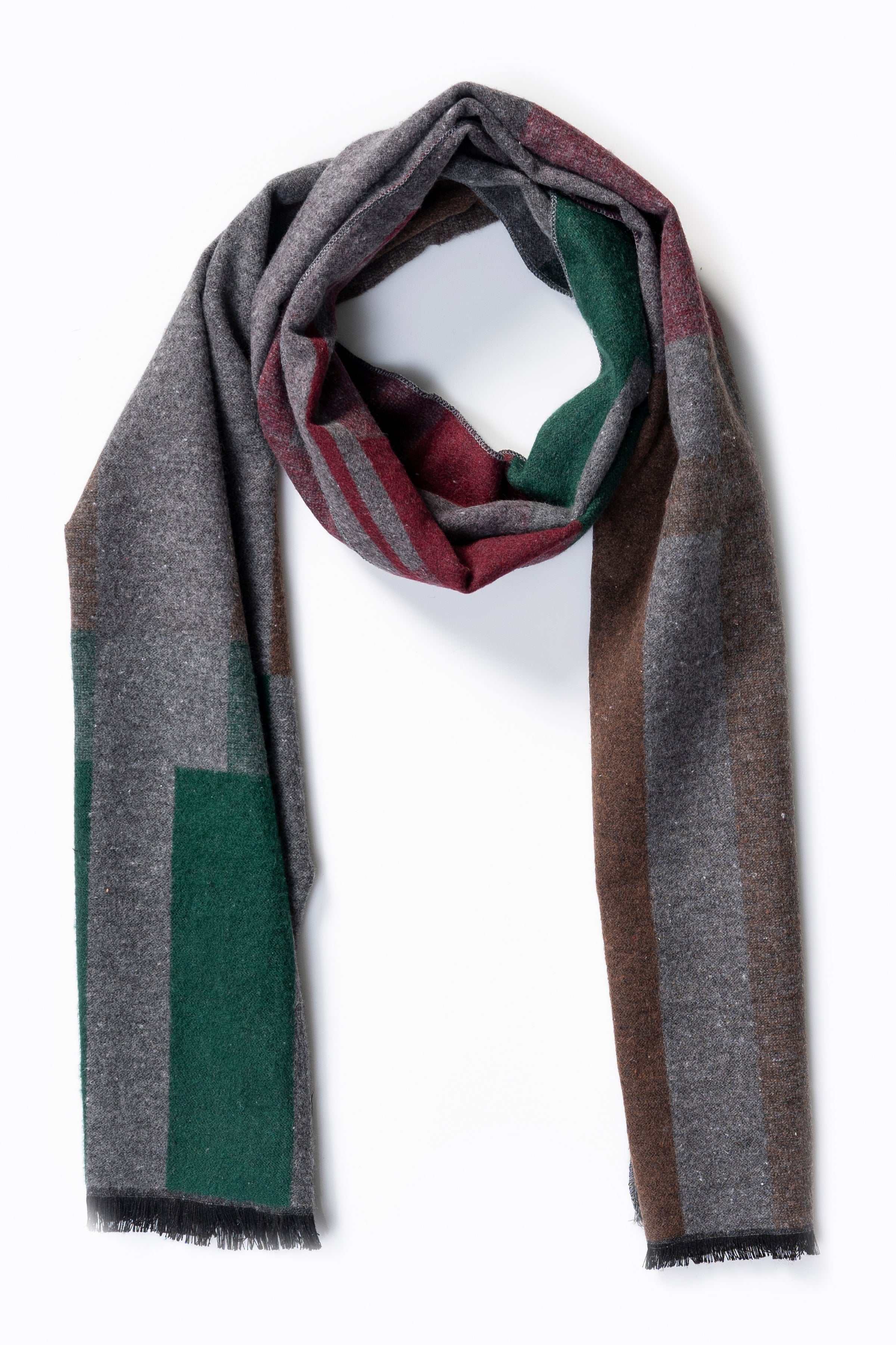 Multicolor patchwork scarf folded in a loop; gray, green, and brown