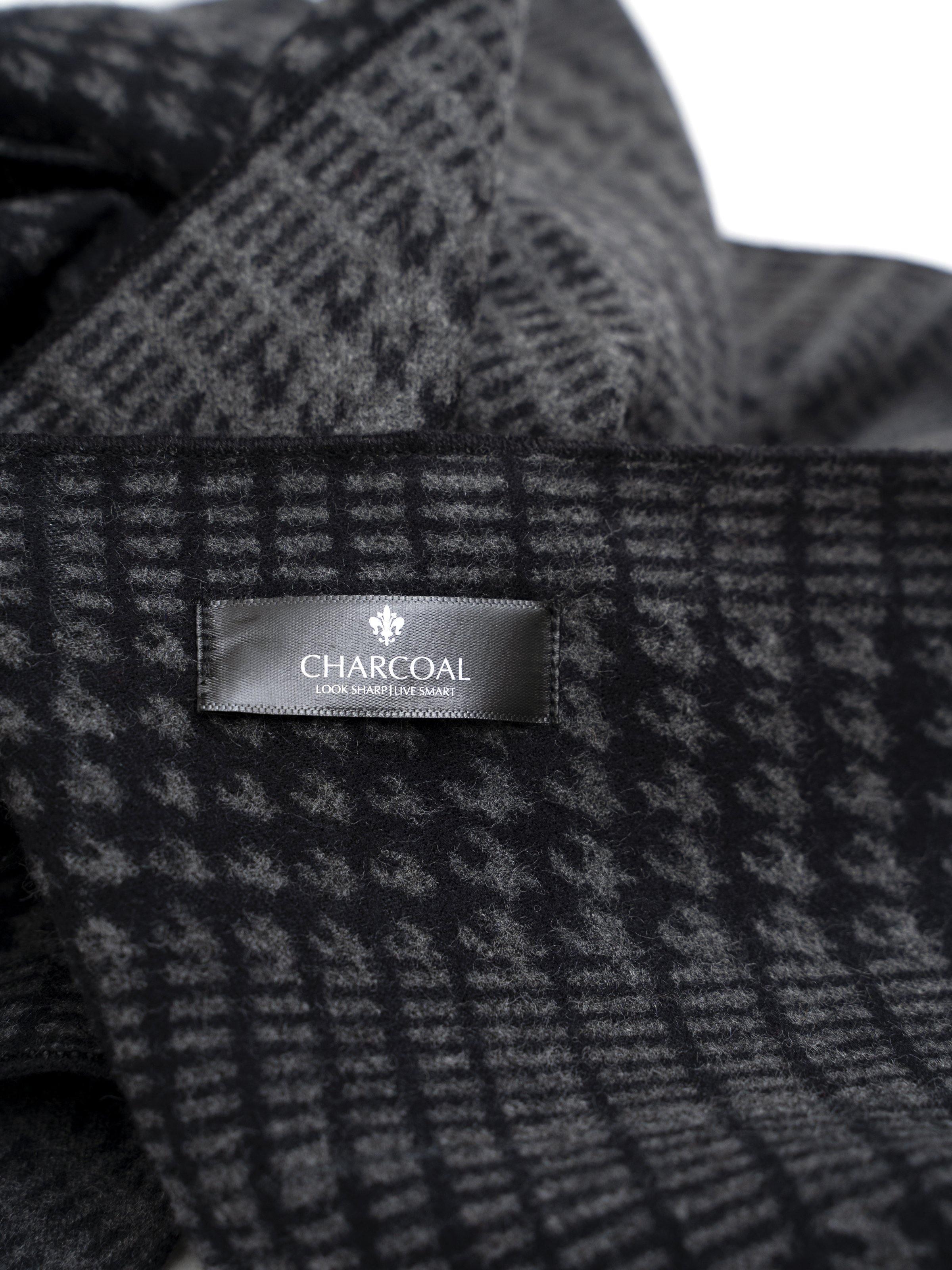 Scarf with dark charcoal woven check pattern and CHARCOAL fabric label