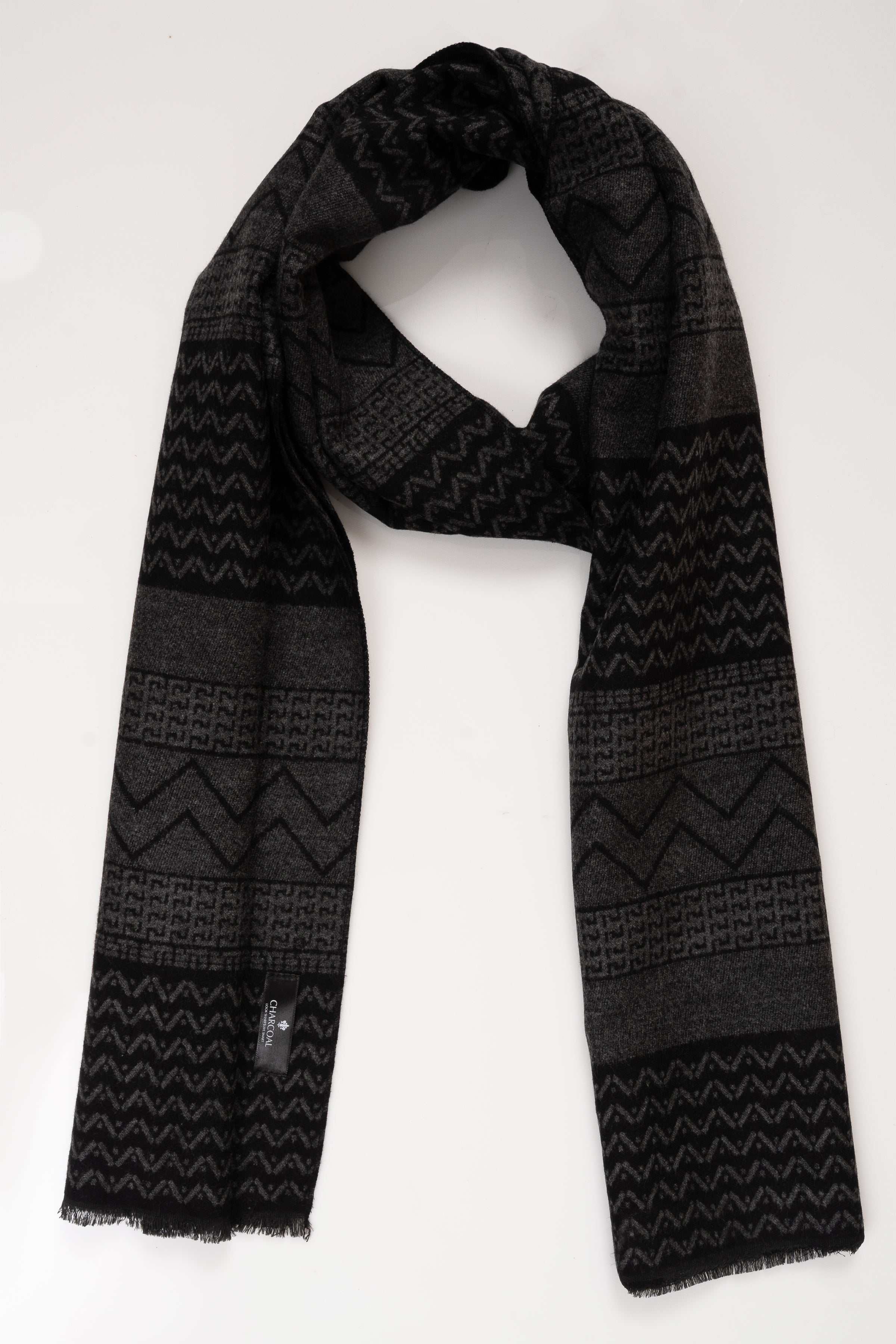 Dark gray black scarf with geometric zigzag and stripe knit pattern